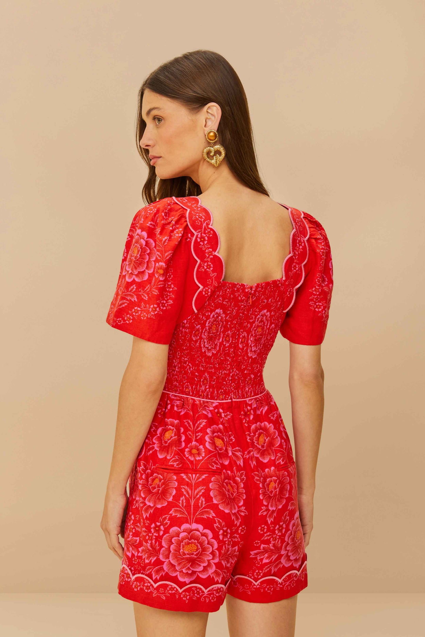 OLIVIA RED CUTOUTS SMOCKED ROMPER