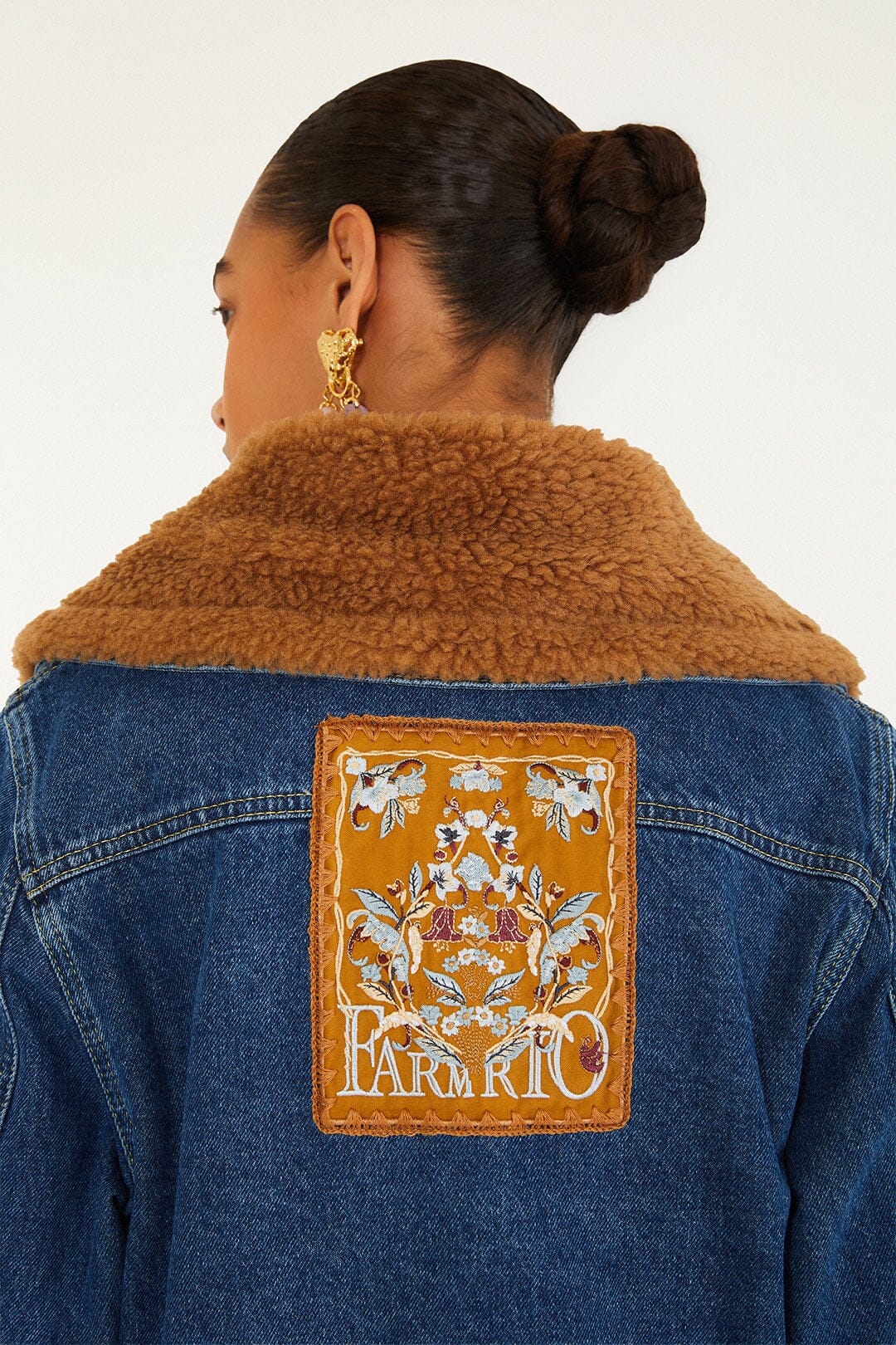 FARM Rio model wearing the Almost Famous Denim Jacket