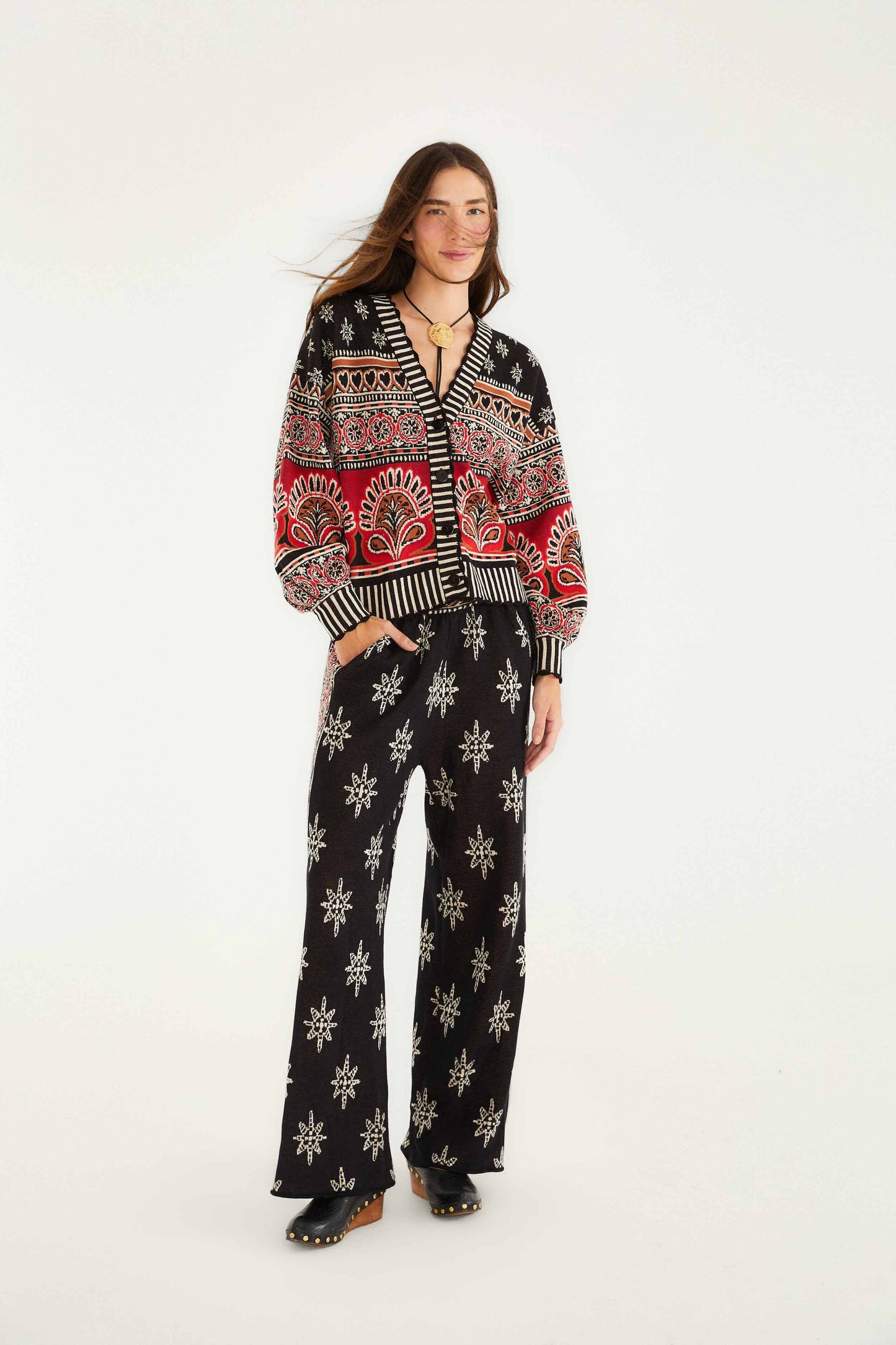 FARM Rio model wearing the Black Ainika Love Coconut Groove Knit Cardigan