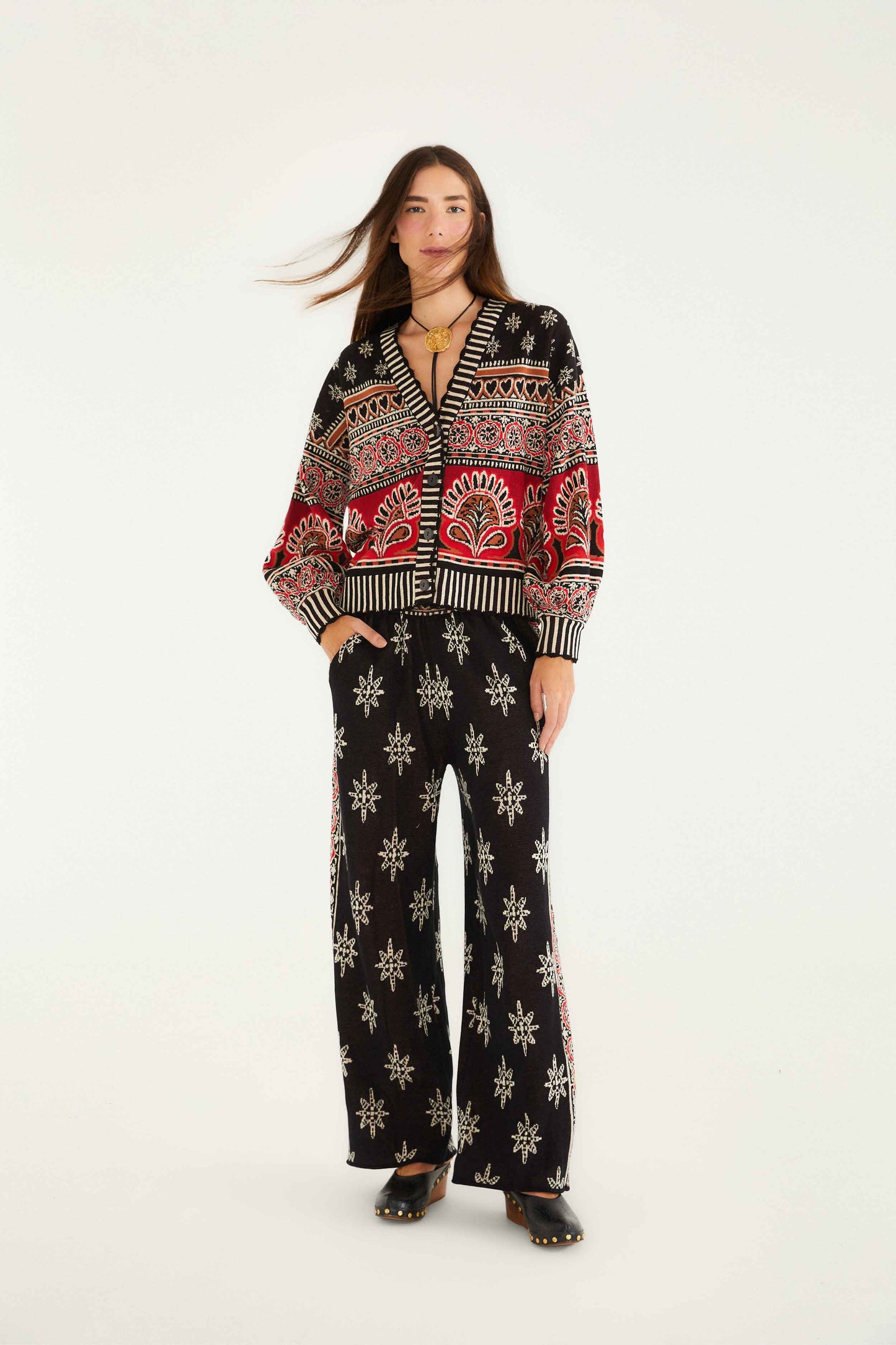 FARM Rio model wearing the Black Ainika Love Coconut Groove Knit Pants