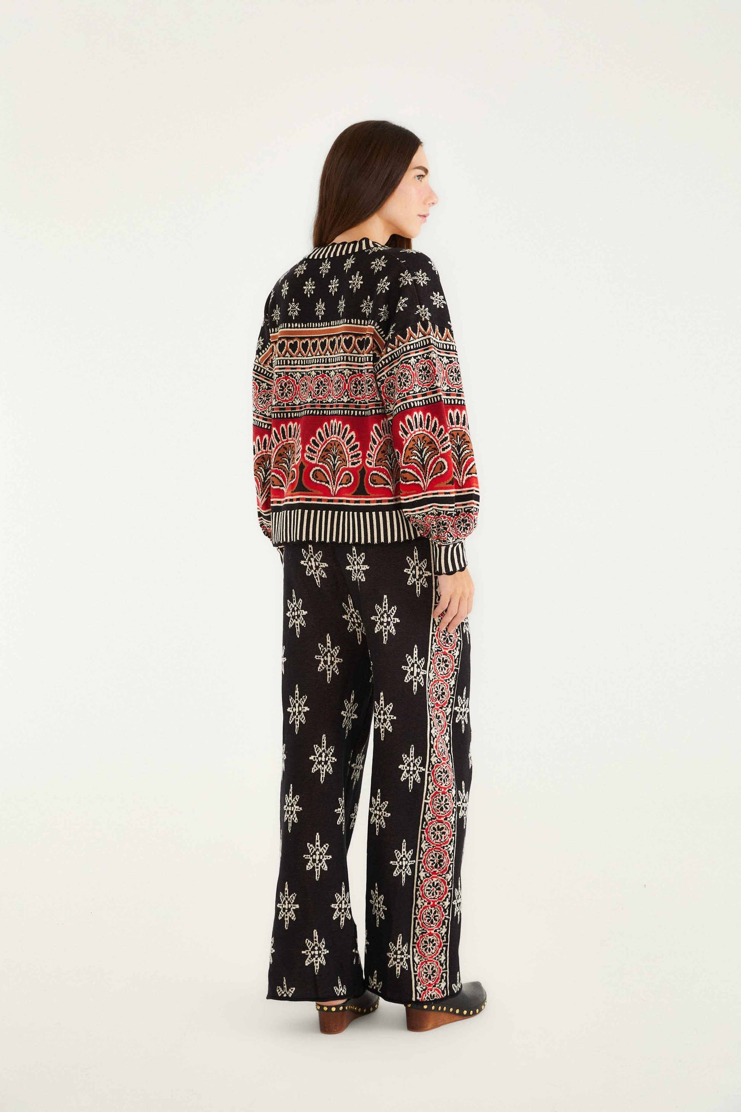 FARM Rio model wearing the Black Ainika Love Coconut Groove Knit Pants