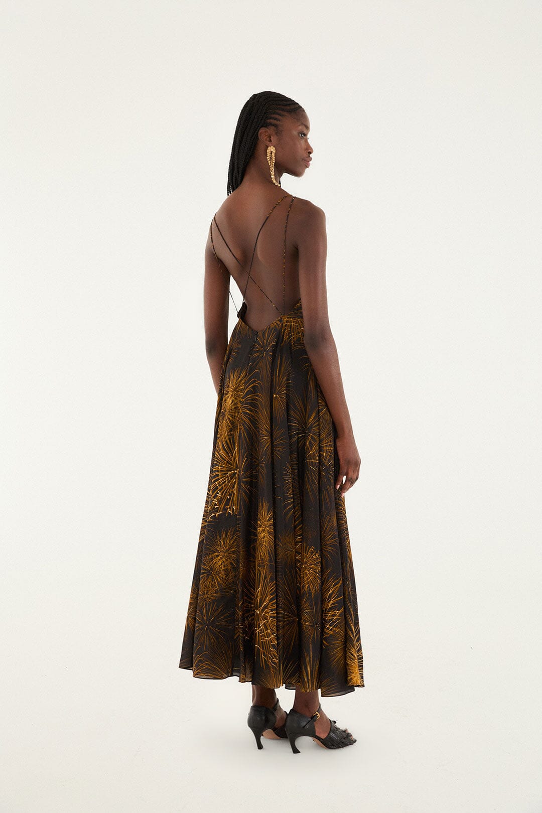 FARM Rio model wearing the Black Fireworks Sleeveless Open Back Maxi Dress