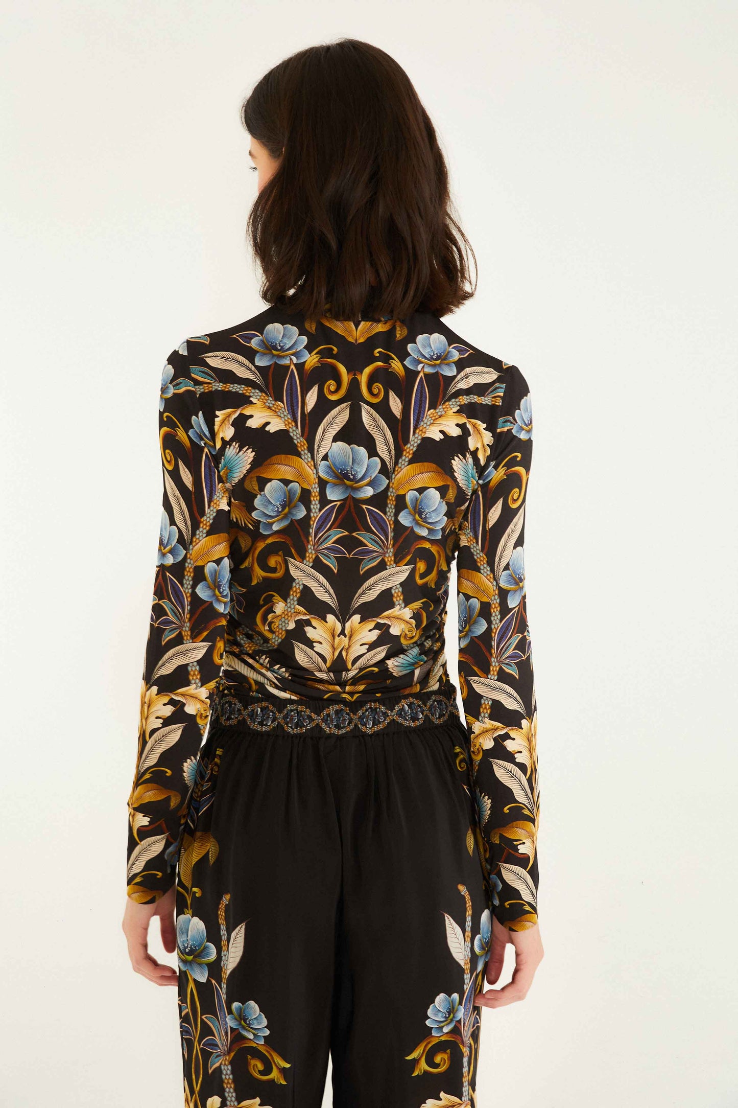 FARM Rio model wearing the Black Flowerful Garden Jersey Blouse