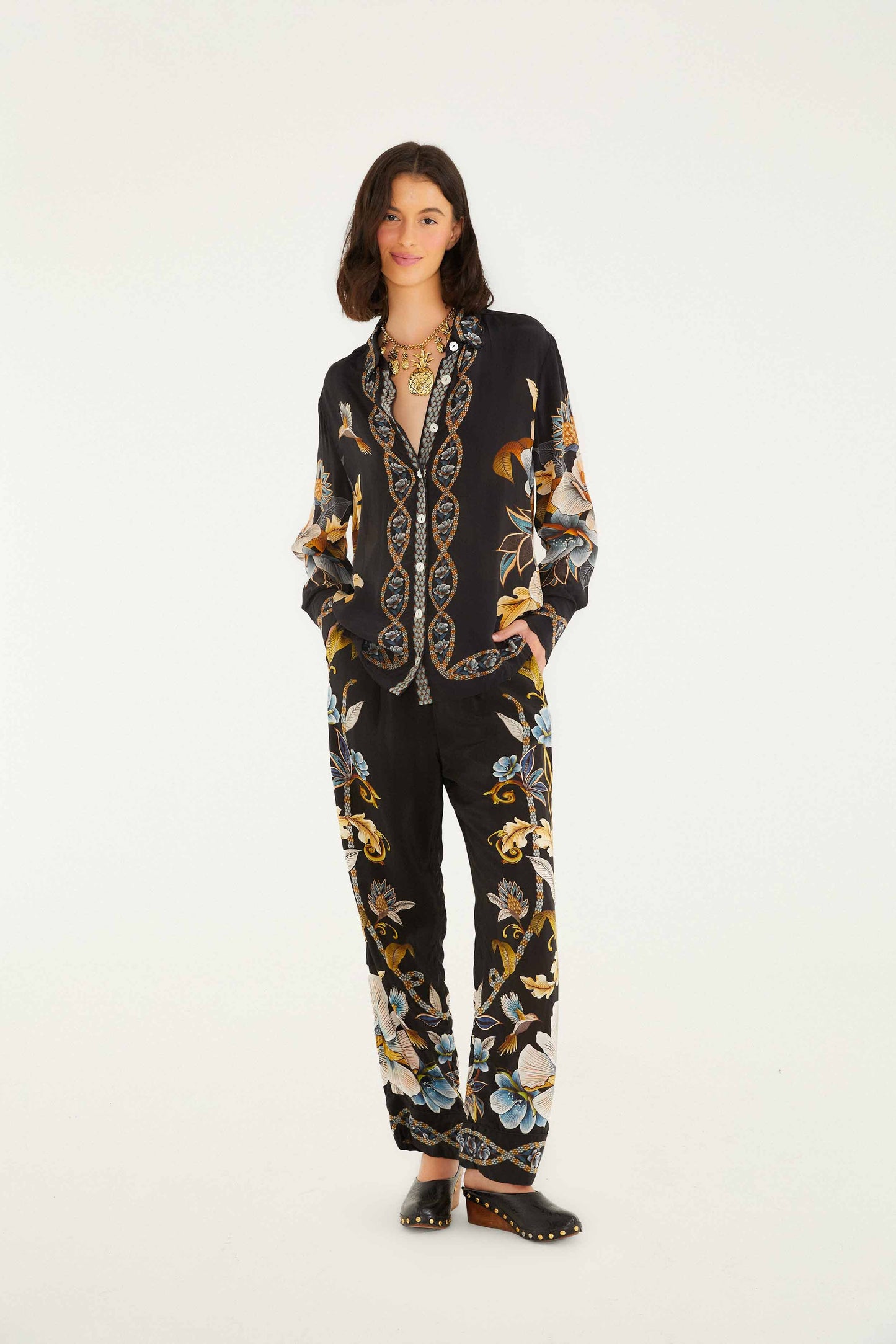 FARM Rio model wearing the Black Flowerful Garden Pajama Pants