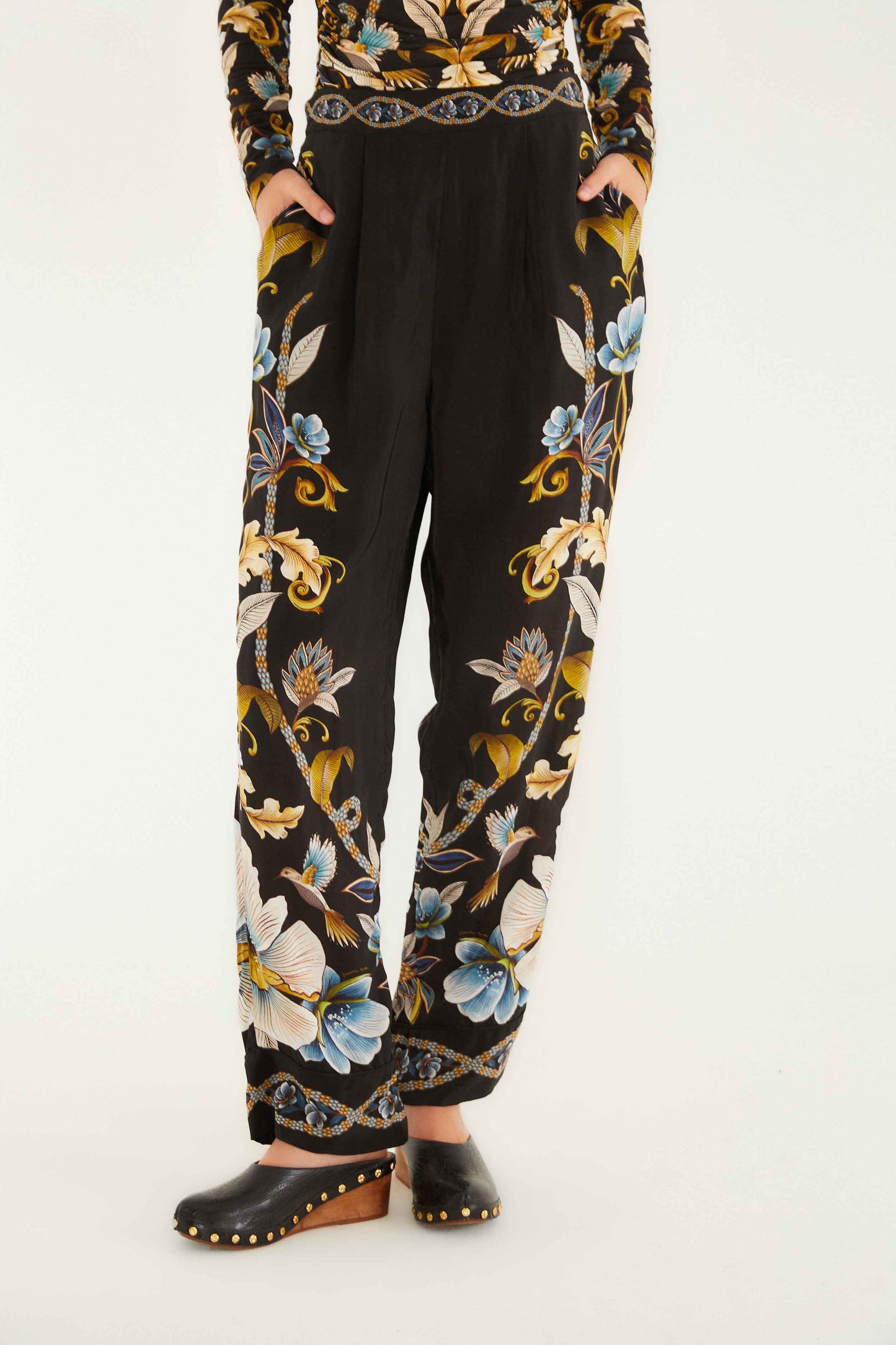 FARM Rio model wearing the Black Flowerful Garden Pajama Pants