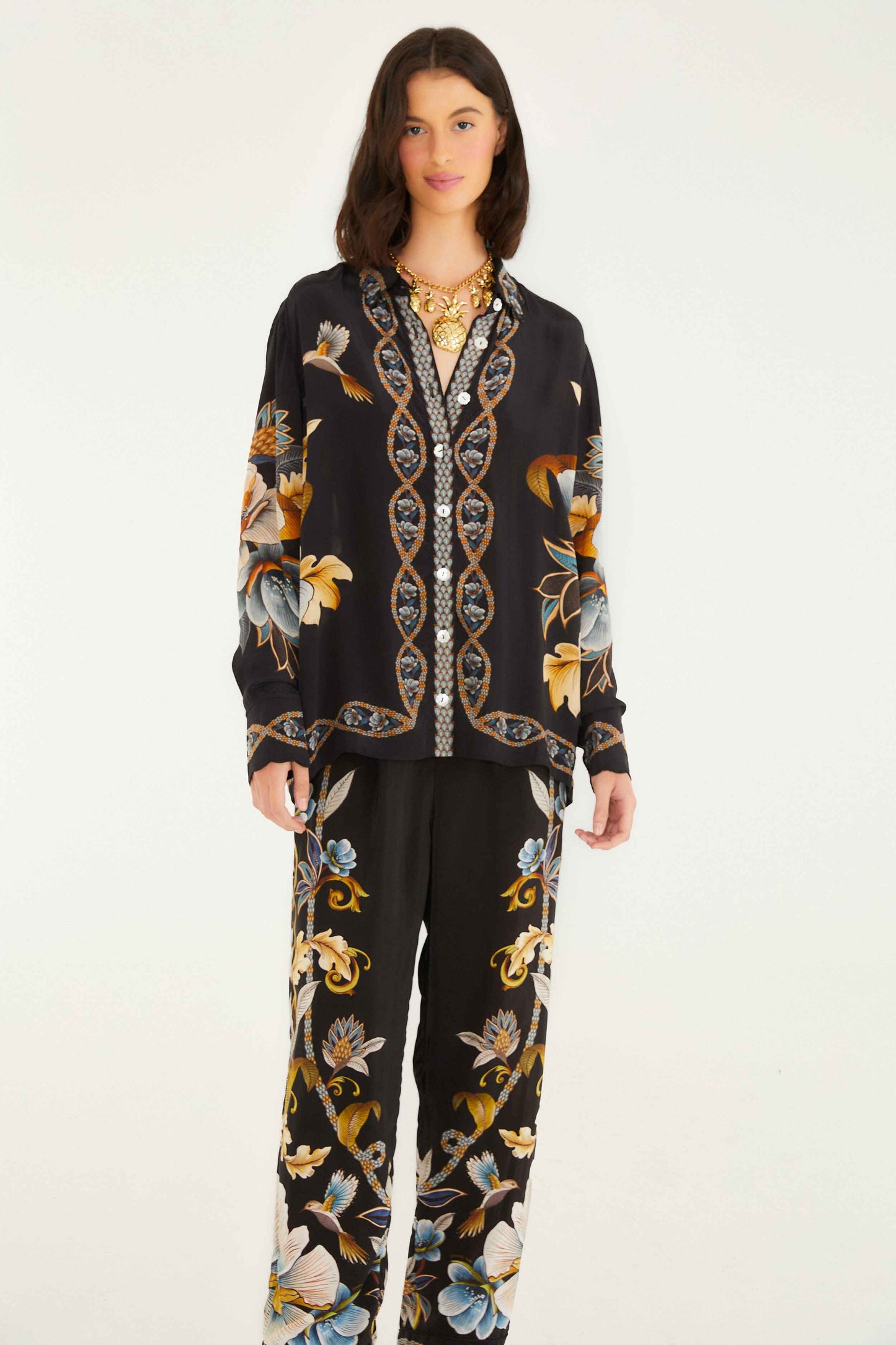 FARM Rio model wearing the Black Flowerful Garden Pajama Pants