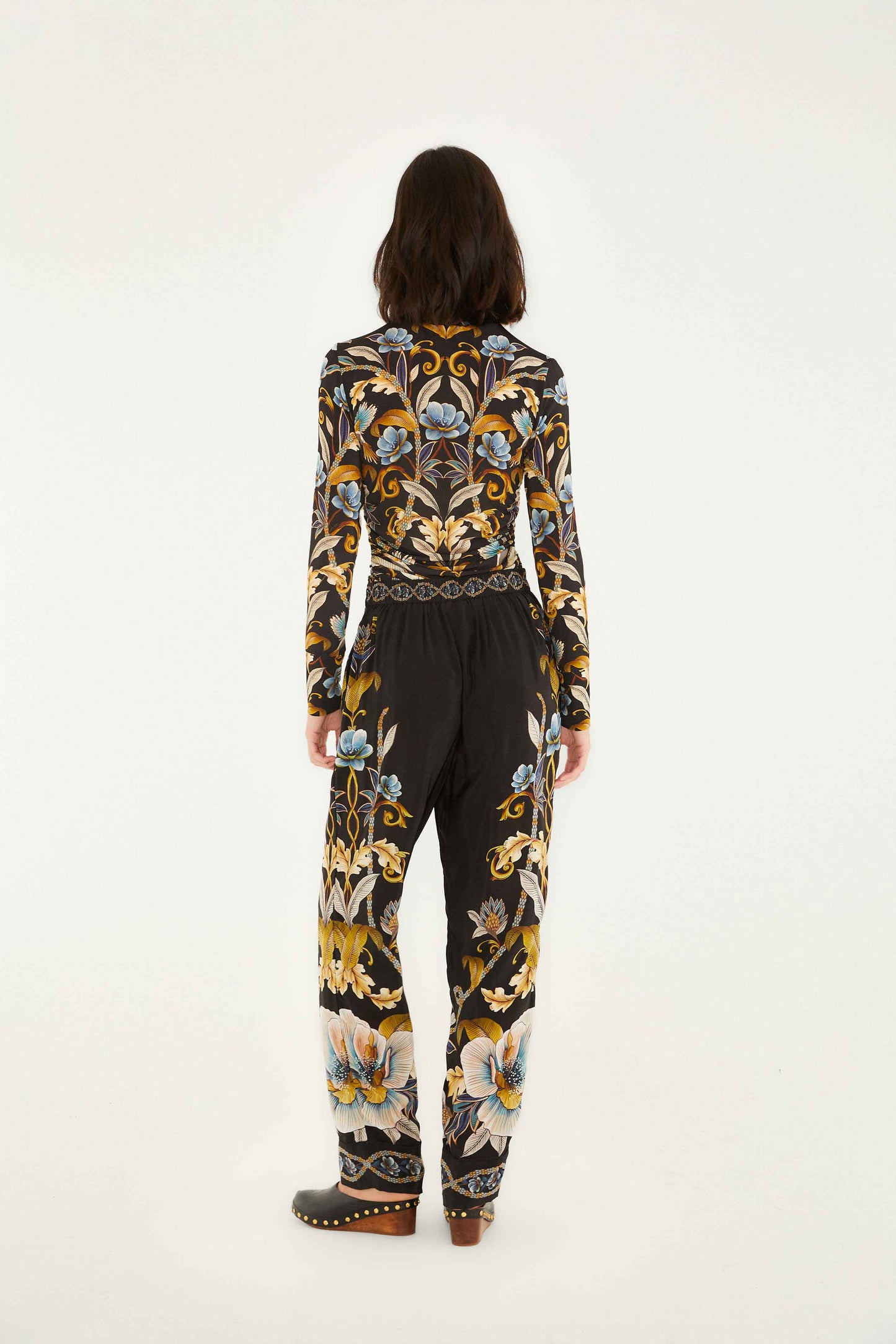 FARM Rio model wearing the Black Flowerful Garden Pajama Pants