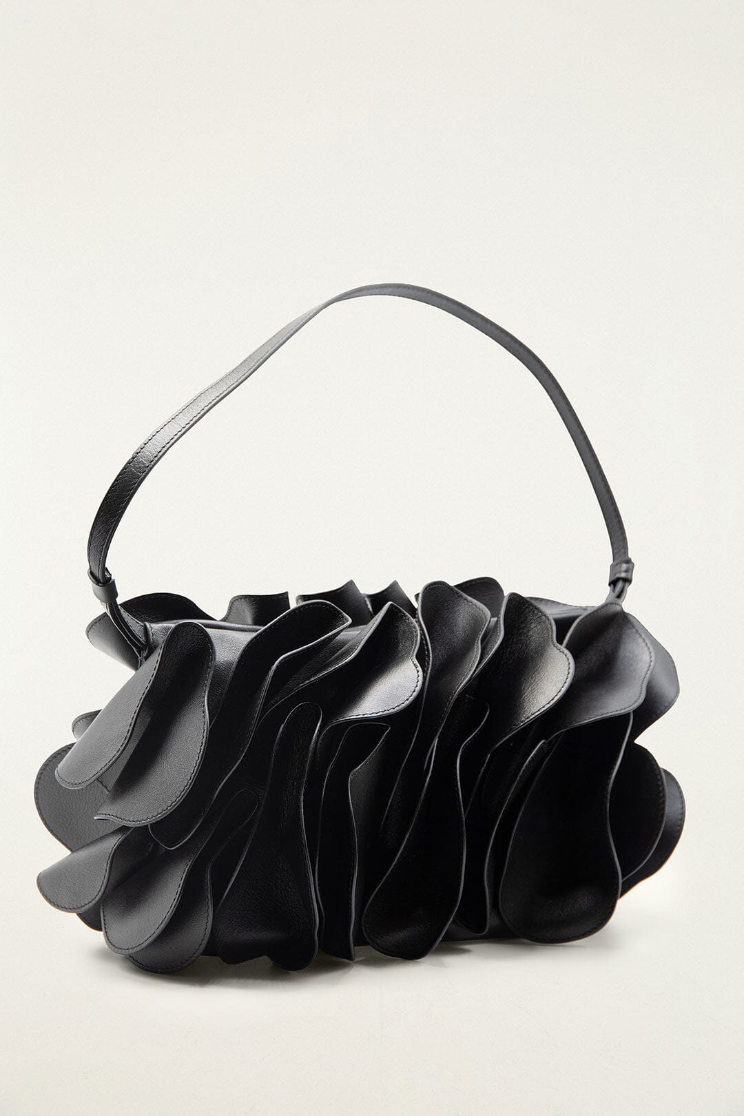 FARM Rio model wearing the Black Leather Shoulder Flower Bag