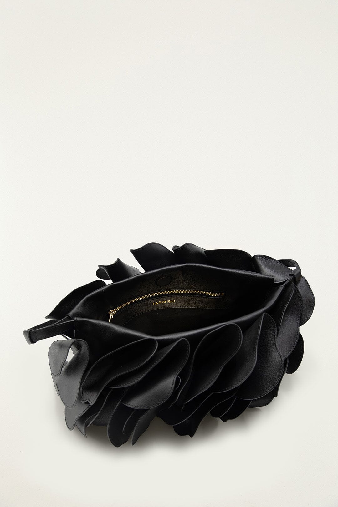 FARM Rio model wearing the Black Leather Shoulder Flower Bag