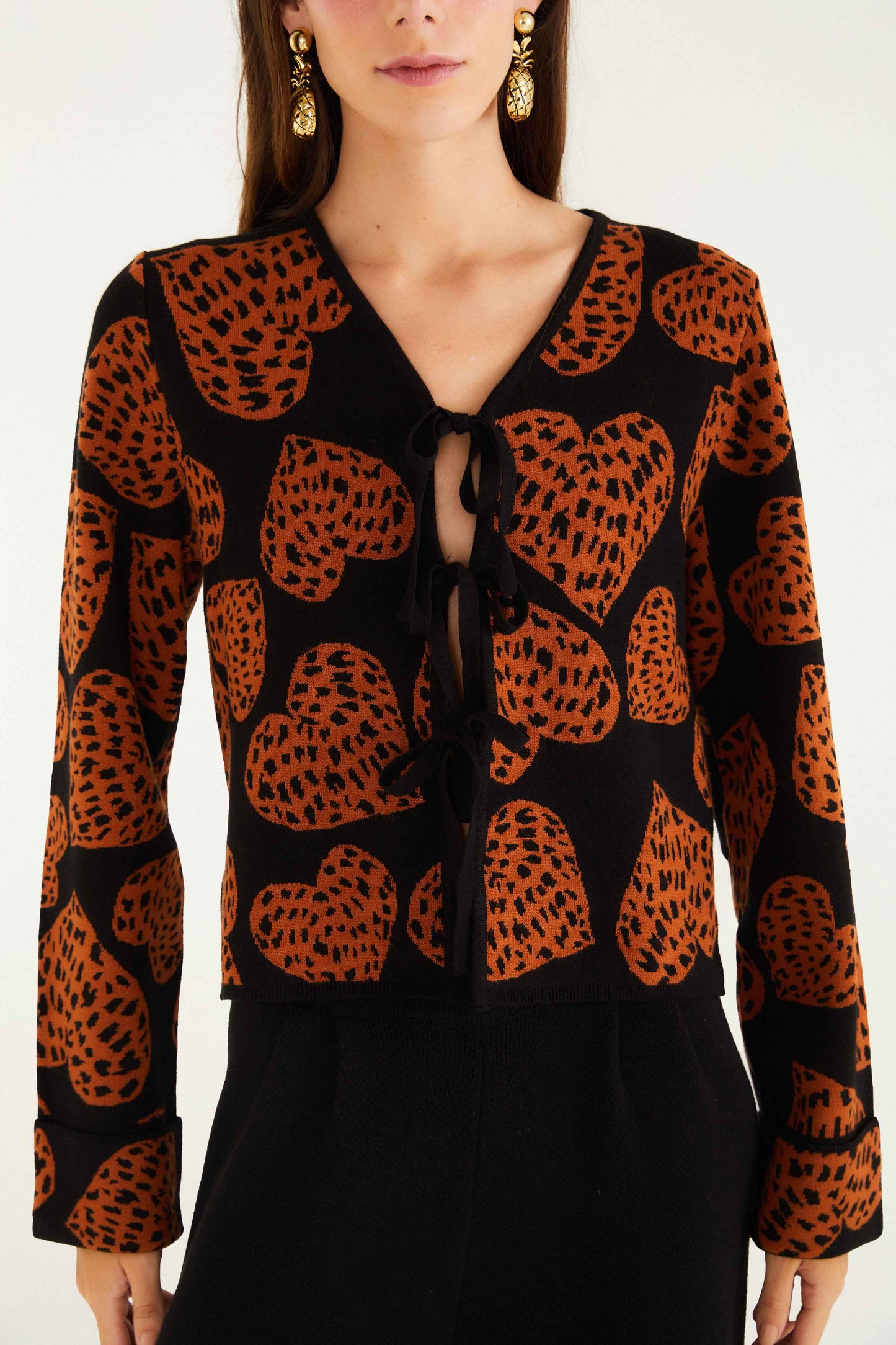 FARM Rio model wearing the Black Leopard Hearts Front Ties Knit Cardigan