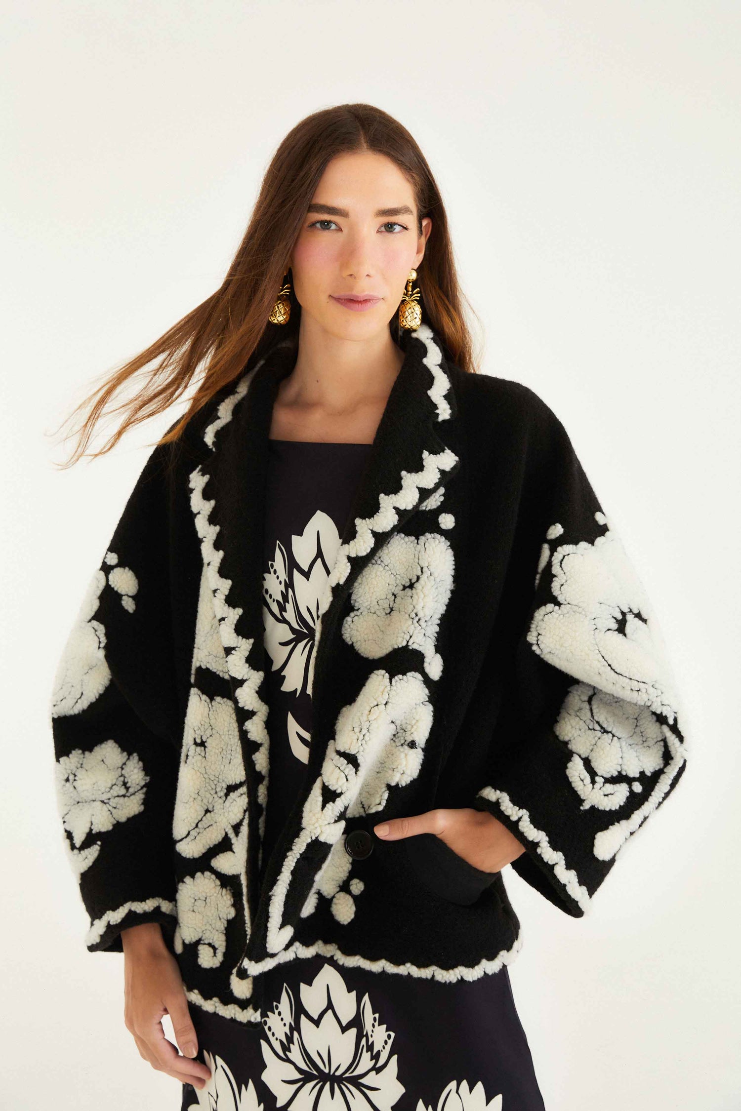 FARM Rio model wearing the Black & White Floral Arabesque Fleece Coat