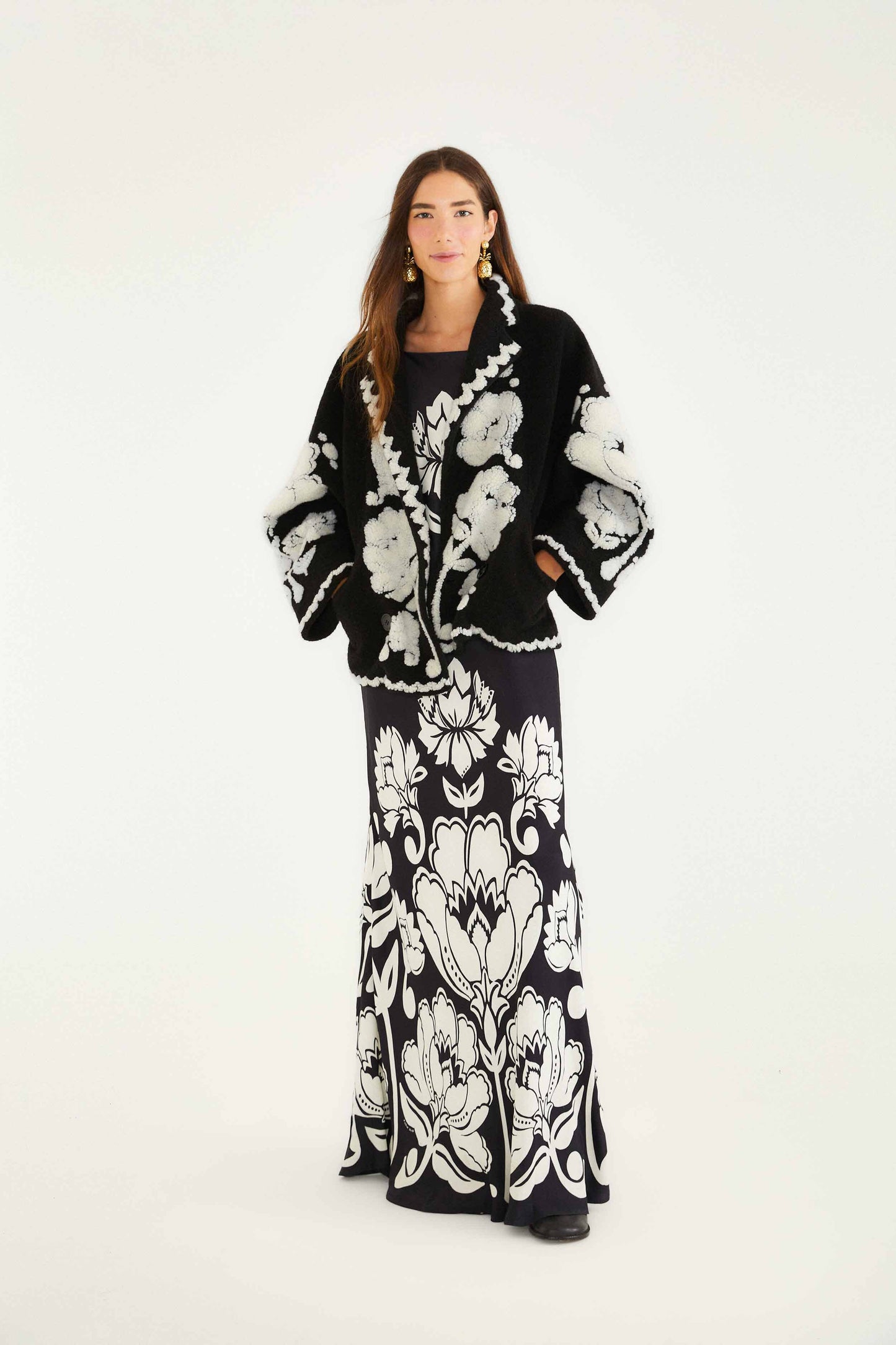 FARM Rio model wearing the Black & White Floral Arabesque Fleece Coat