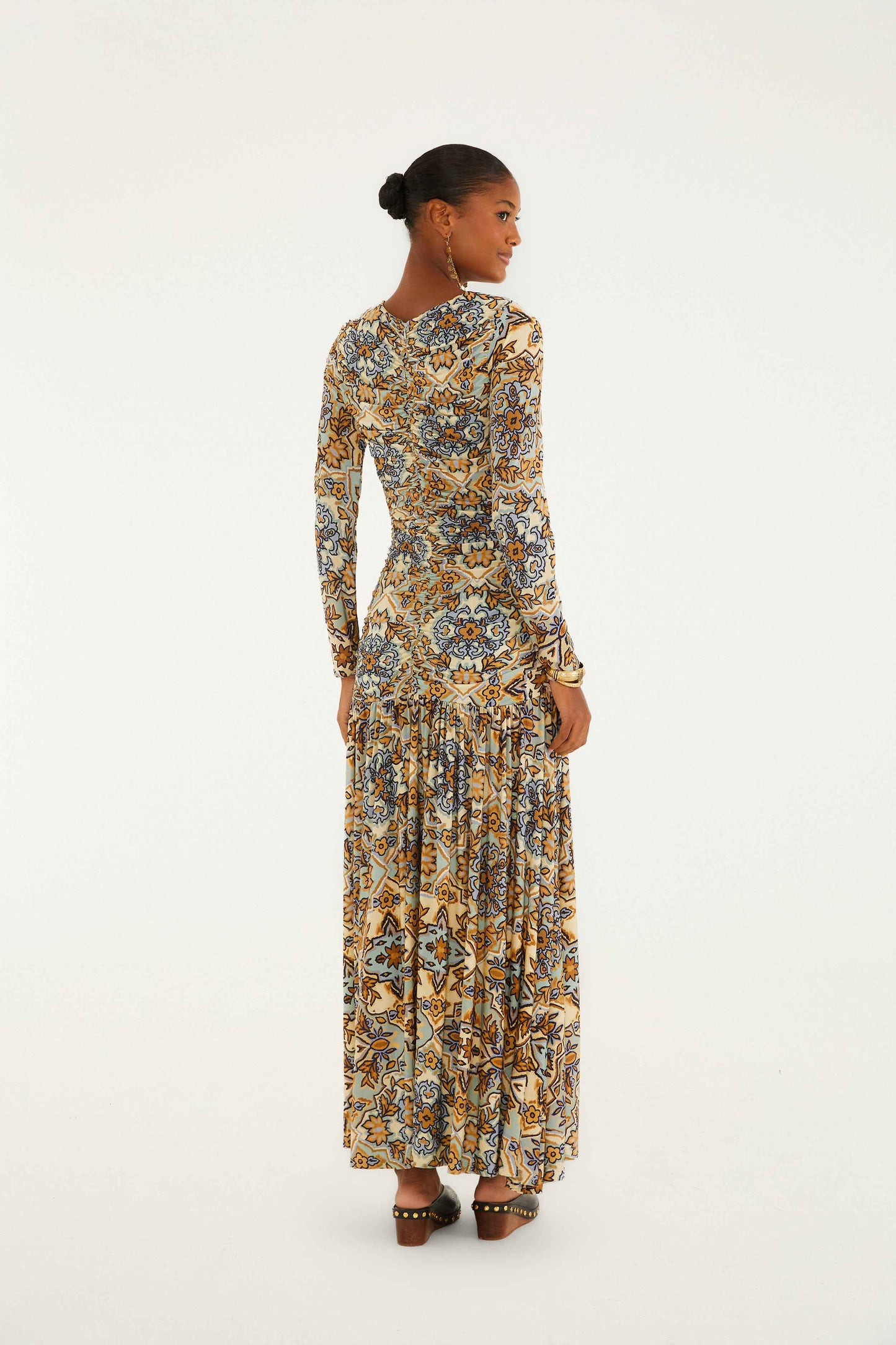 FARM Rio model wearing the Blue Winter Tapestry Long Sleeve Maxi Dress