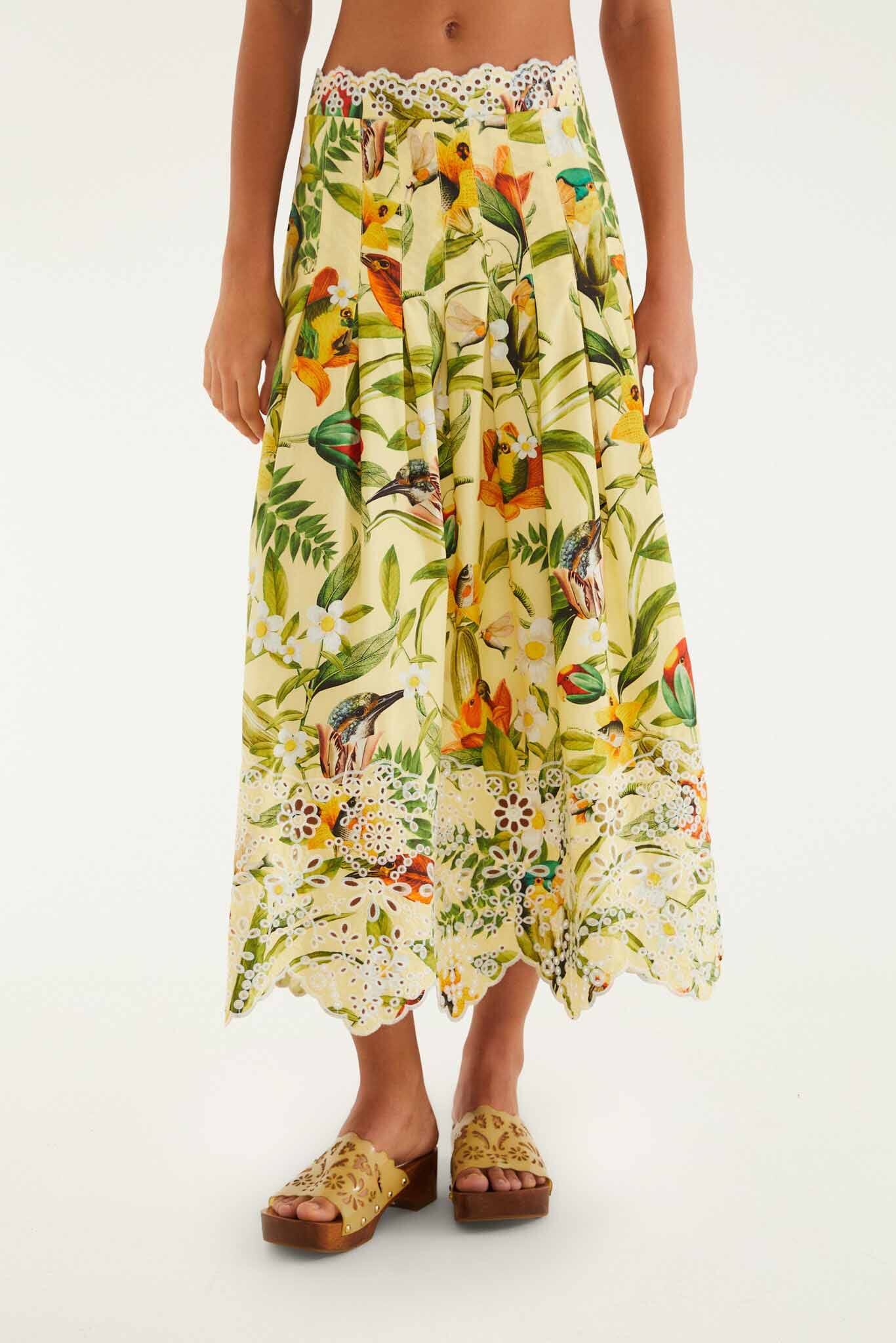 FARM Rio model wearing the Brasil Collage Soft Yellow Maxi Skirt