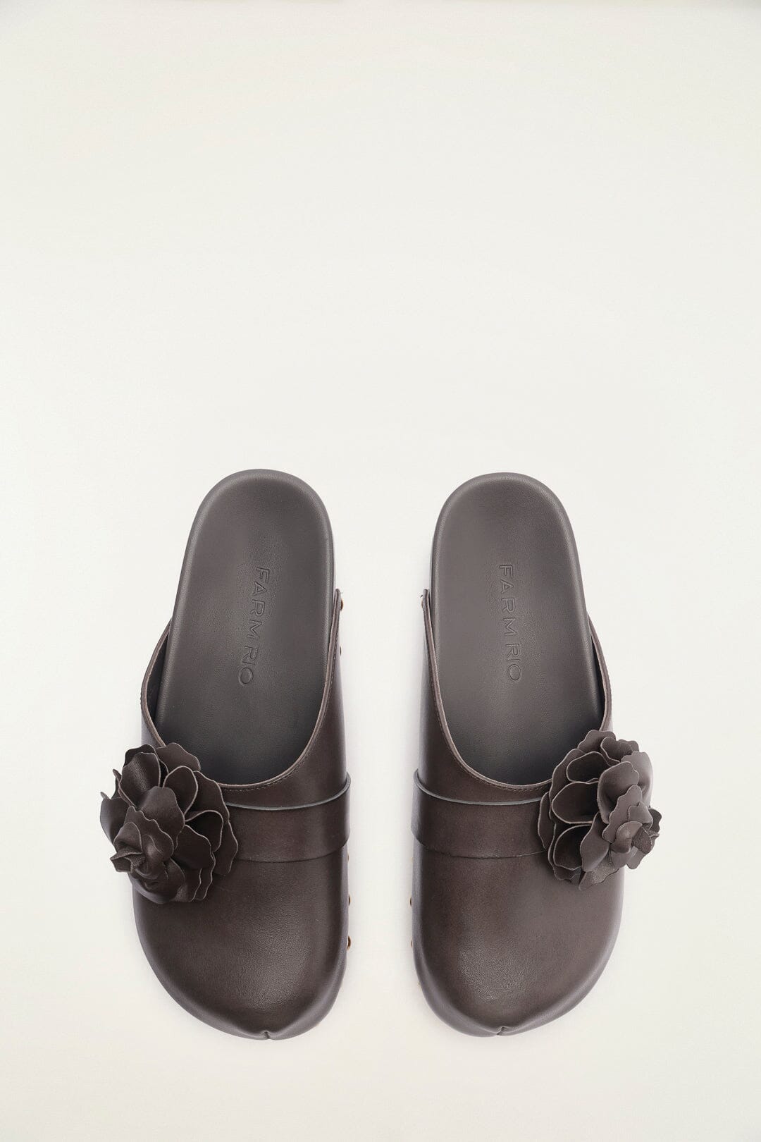 FARM Rio model wearing the Dark Brown Flower Clog
