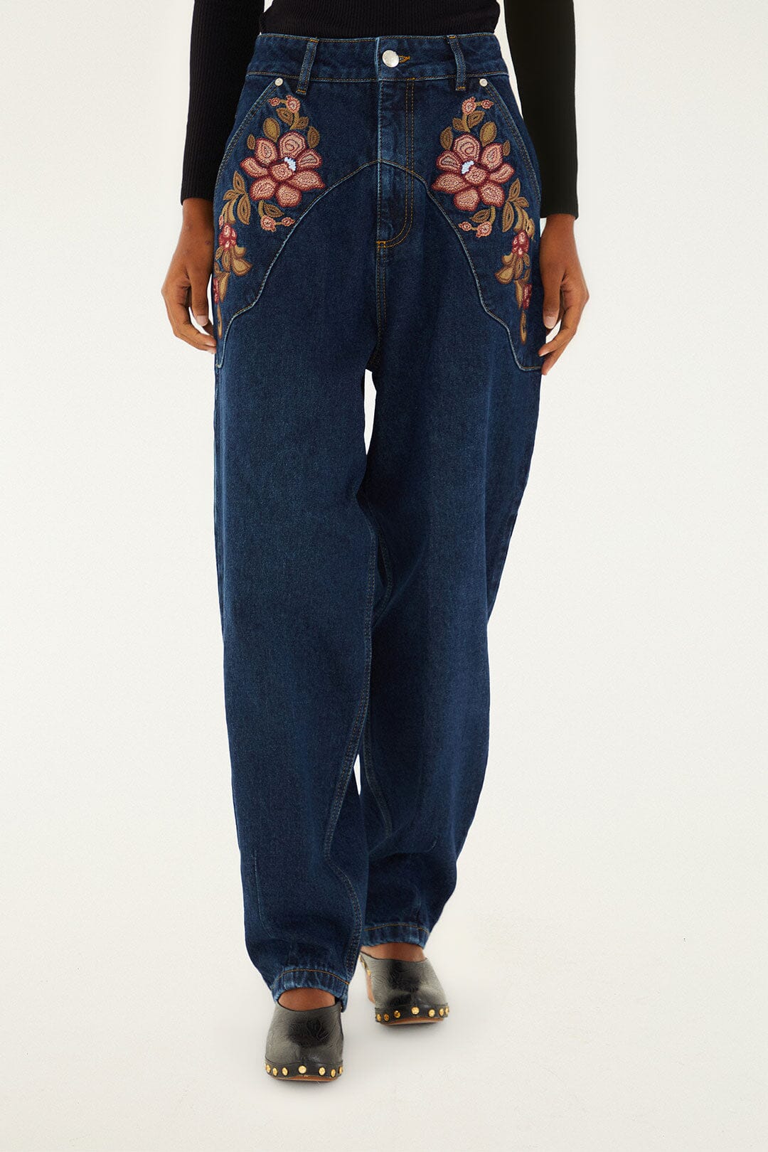 FARM Rio model wearing the Denim Floral Embroidery Pants