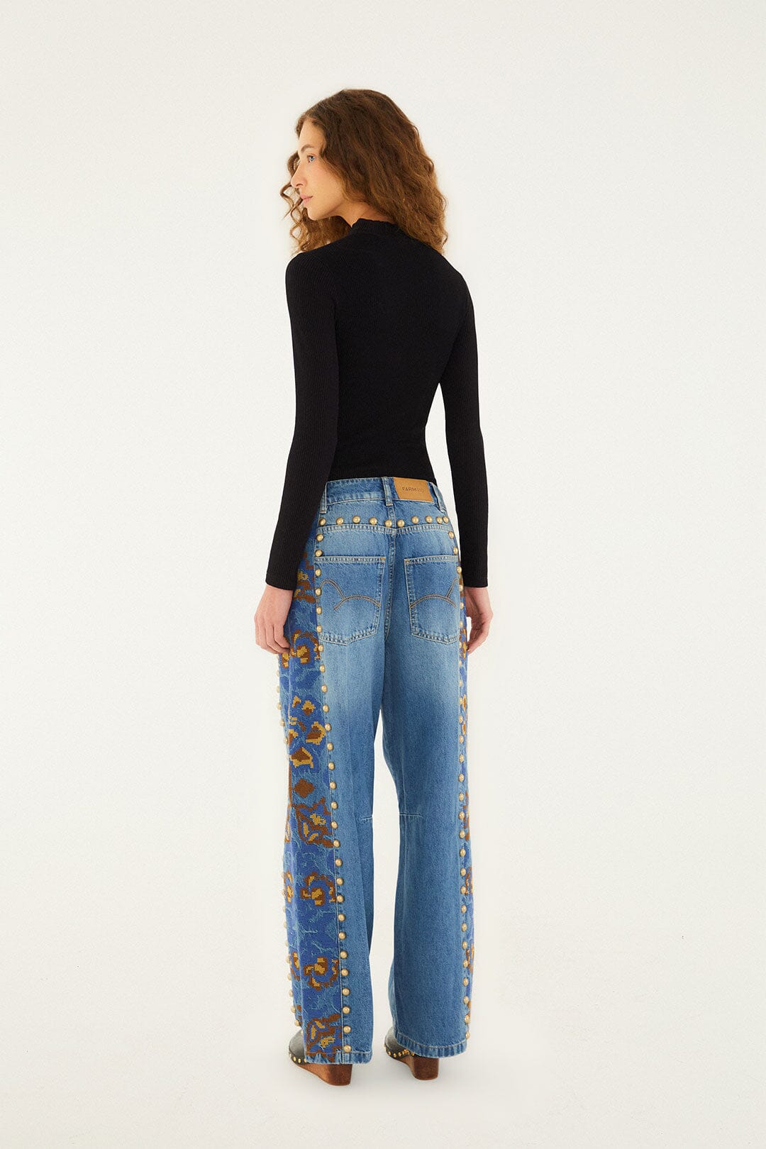 FARM Rio model wearing the Denim Metal Details Embroidered High Waist Pants