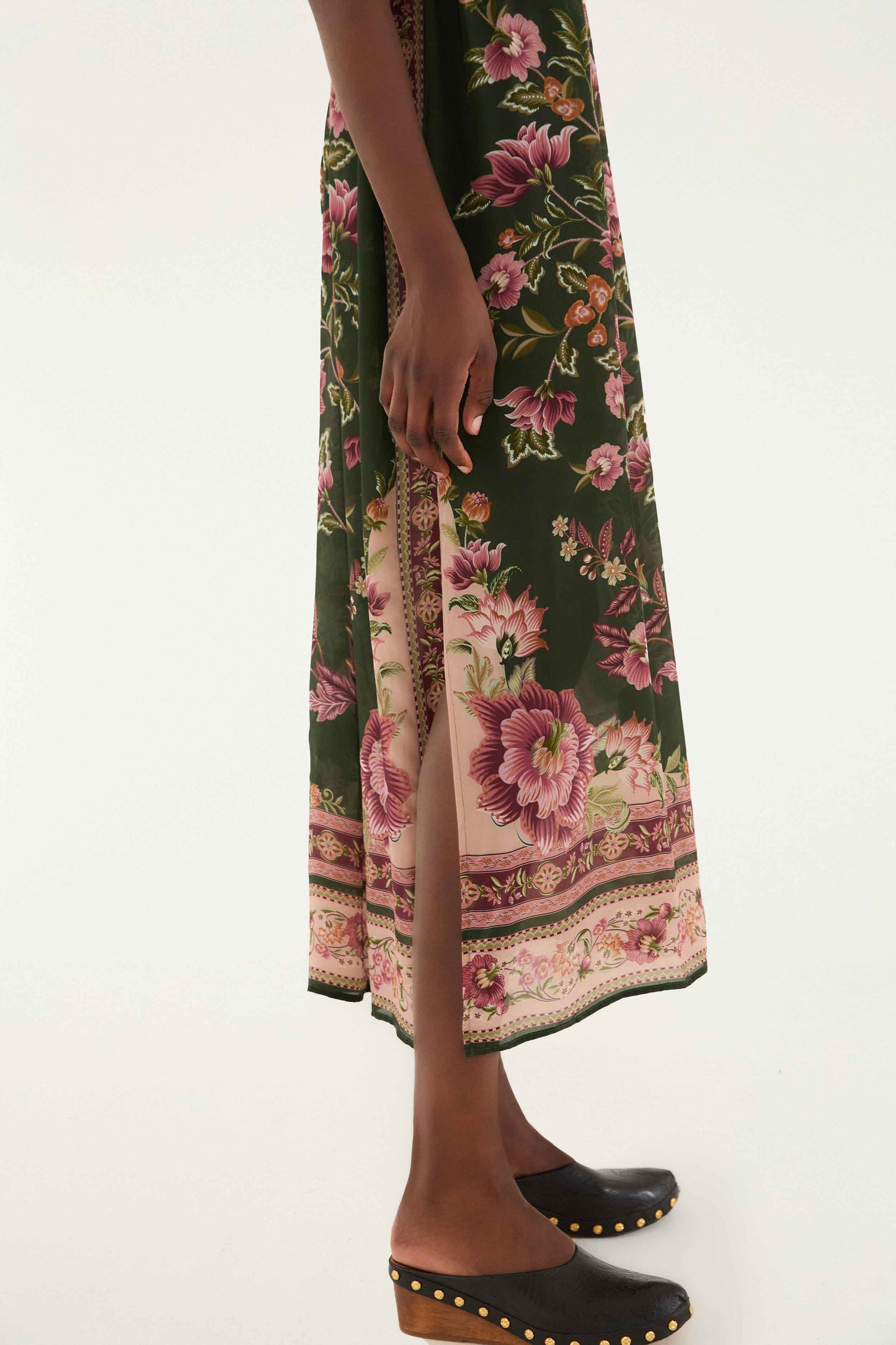 FARM Rio model wearing the Flowering Garden Tree Green Sleveeless Midi Dress