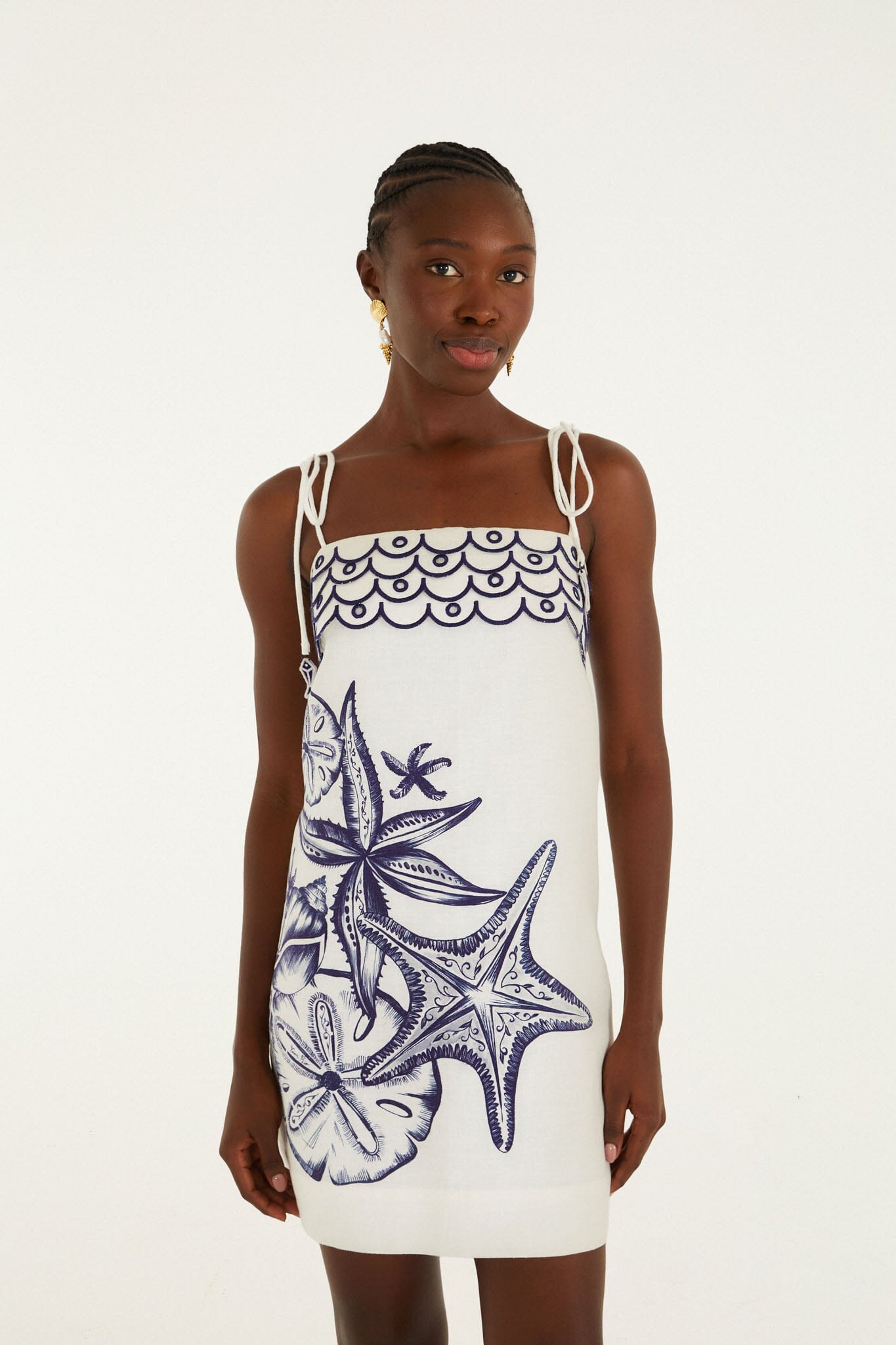 FARM Rio model wearing the Off-White Coast Stars Euroflax Premium Linen Mini Dress