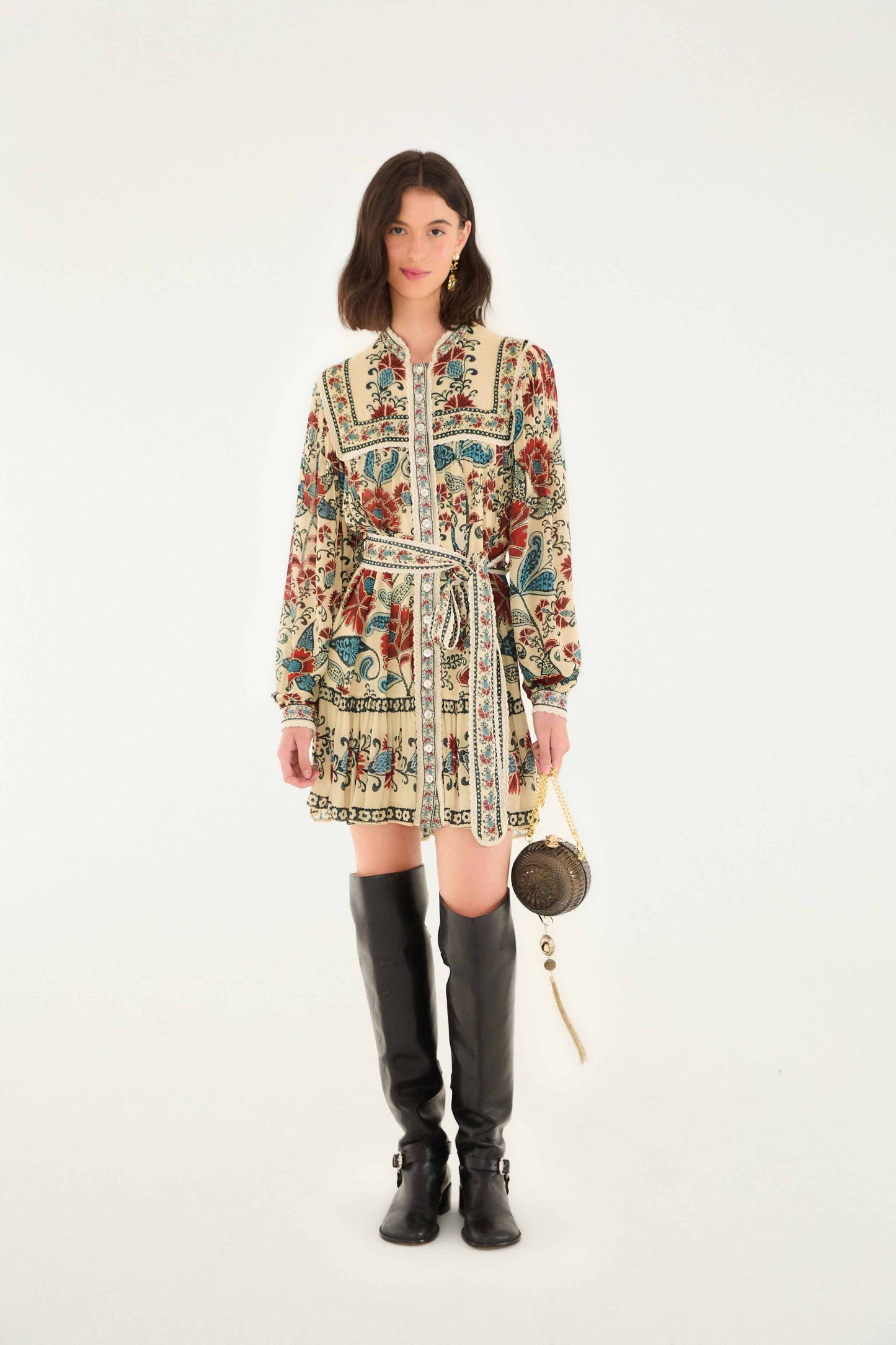 FARM Rio model wearing the Sand Francesca Long Sleeve Mini Dress