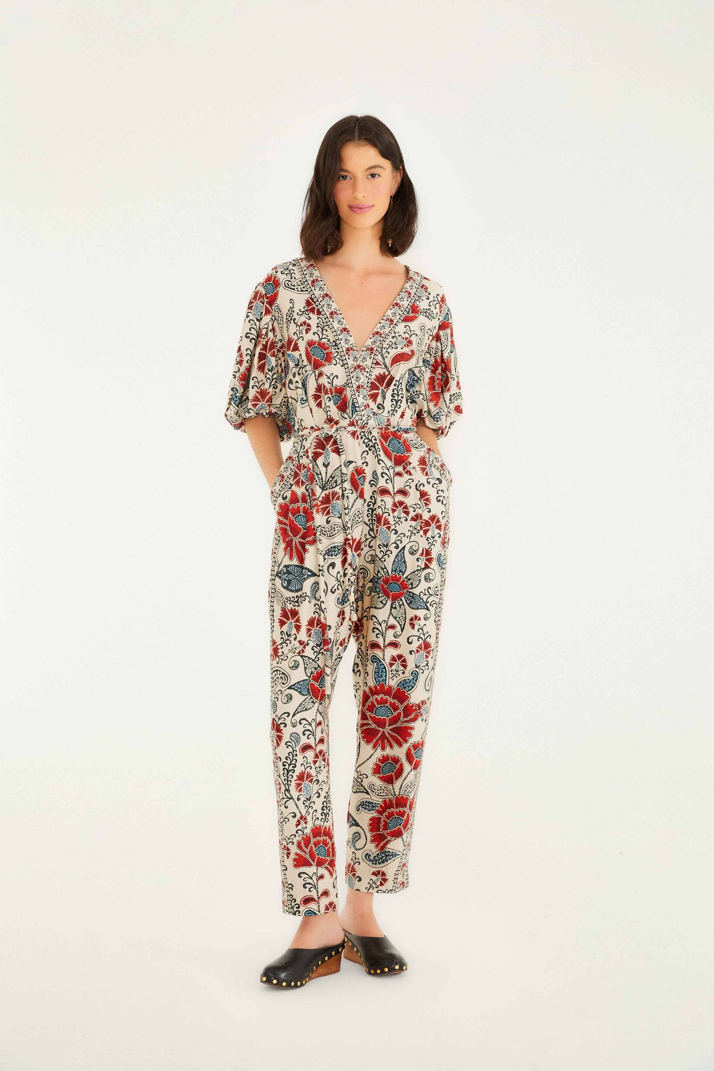 FARM Rio model wearing the Sand Francesca V Neckline Short Sleeve Jumpsuit