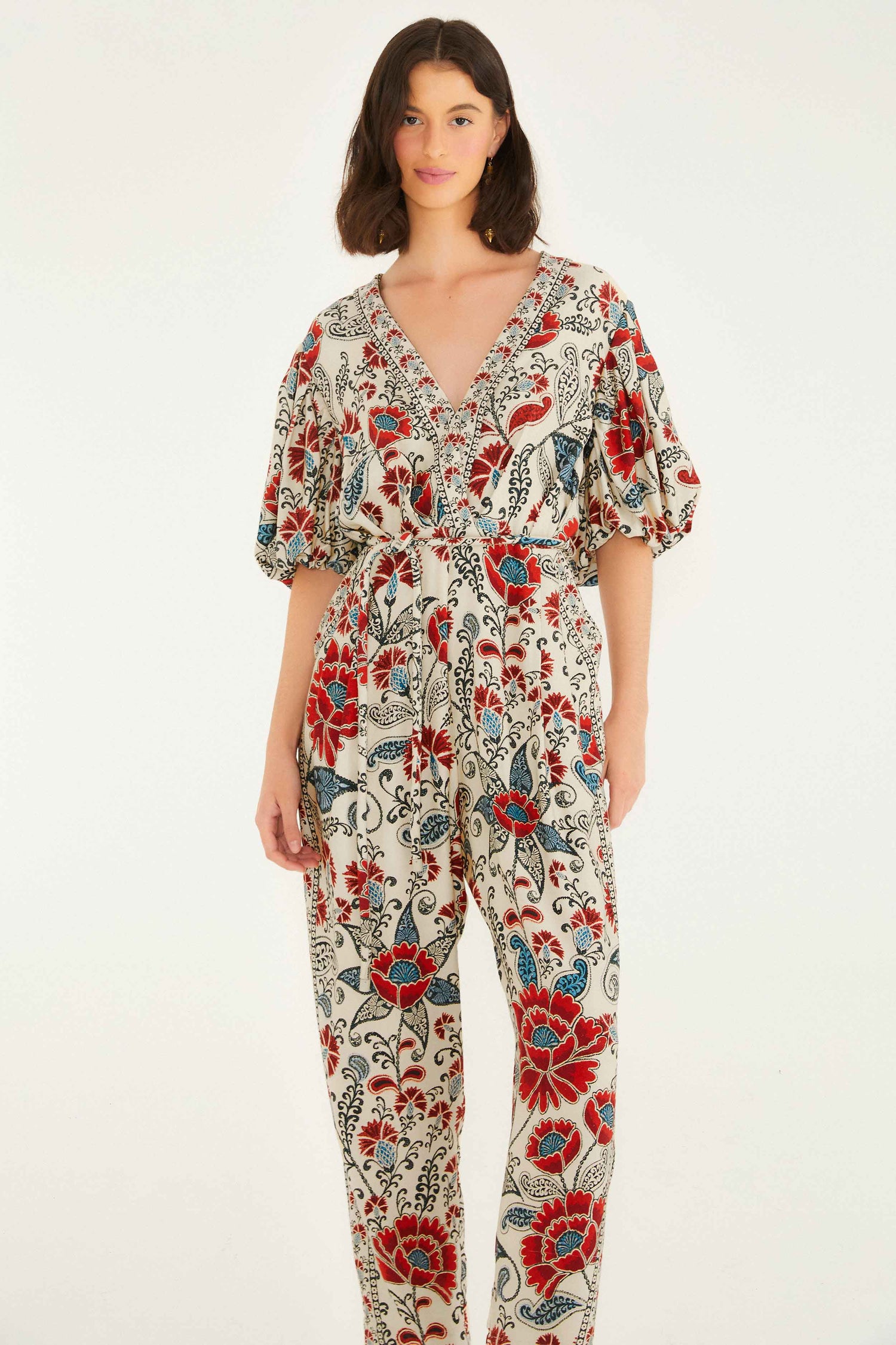 FARM Rio model wearing the Sand Francesca V Neckline Short Sleeve Jumpsuit