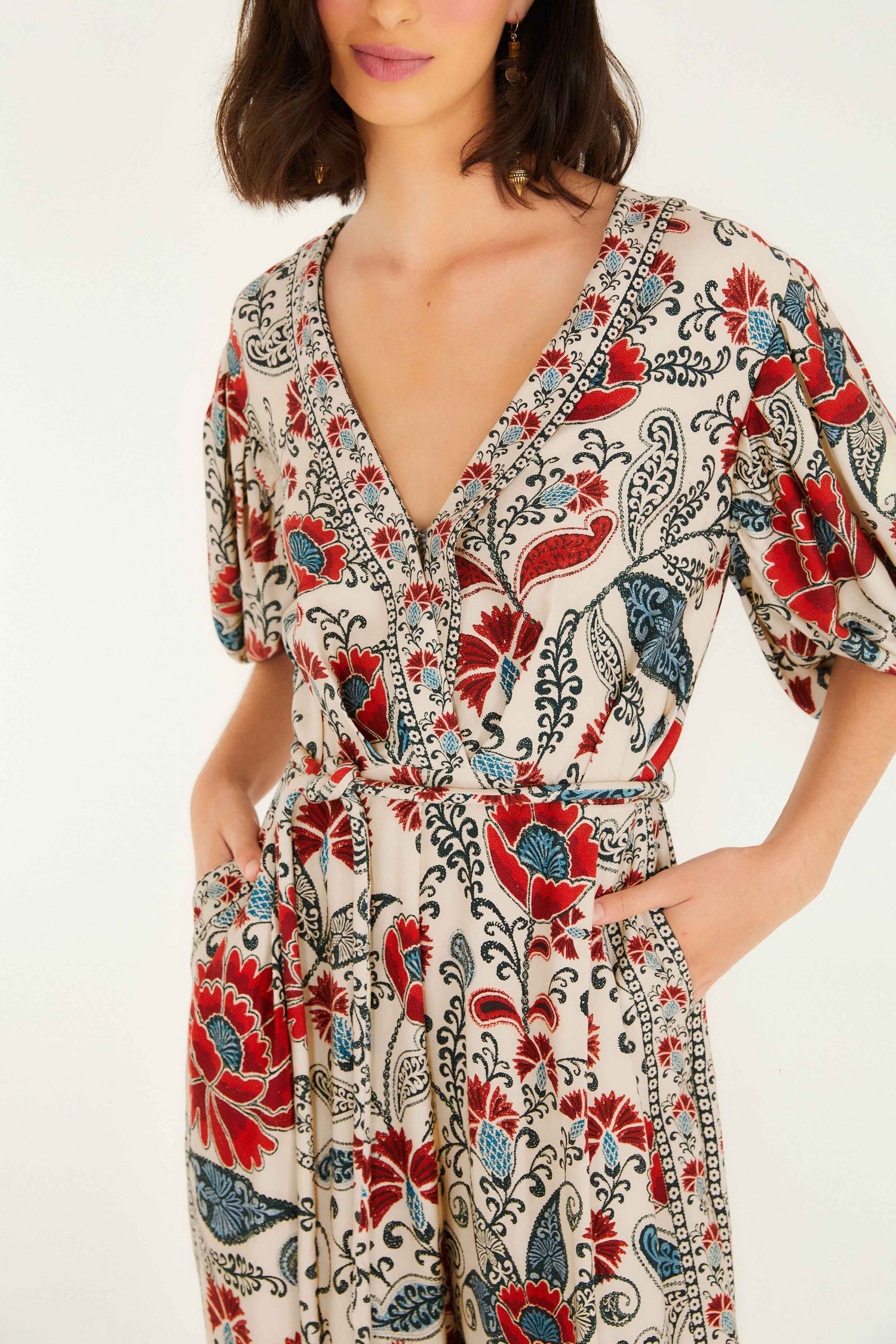 FARM Rio model wearing the Sand Francesca V Neckline Short Sleeve Jumpsuit