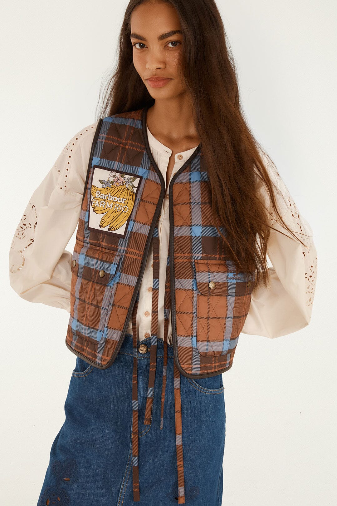 FARM Rio model wearing the Tropical Tea Gilet Vest