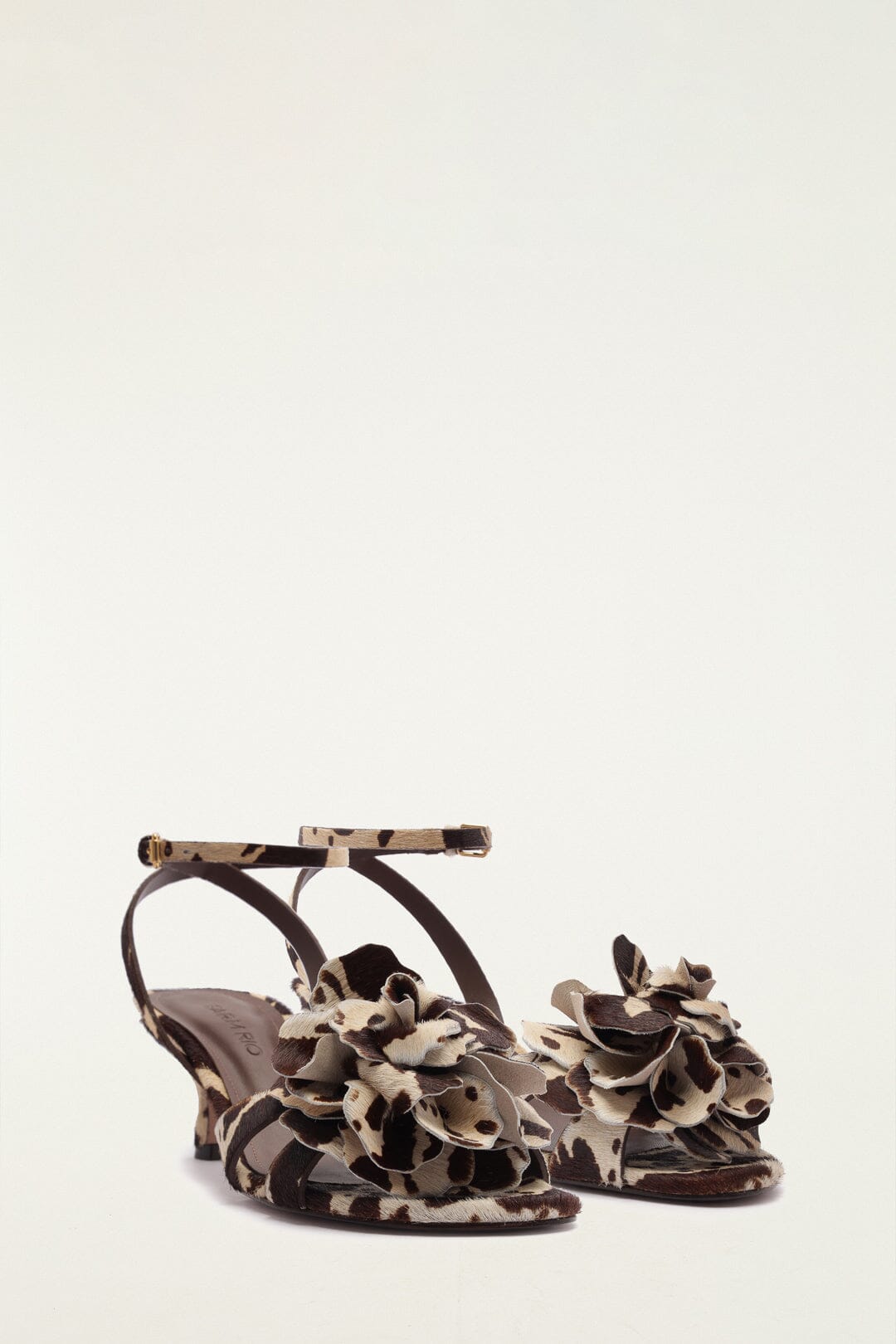 FARM Rio model wearing the Animal Print Flower Heeled Sandal