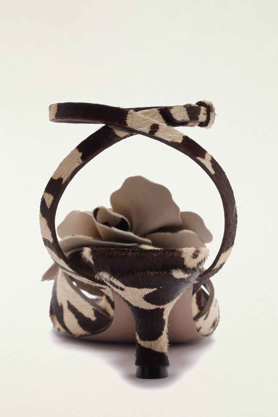 FARM Rio model wearing the Animal Print Flower Heeled Sandal