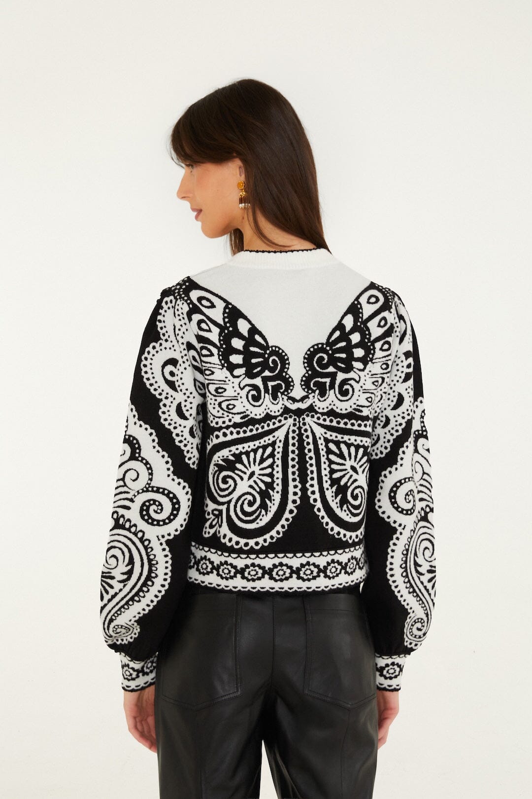 FARM Rio model wearing the Arabesque Butterlfy Buttoned Knit Cardigan