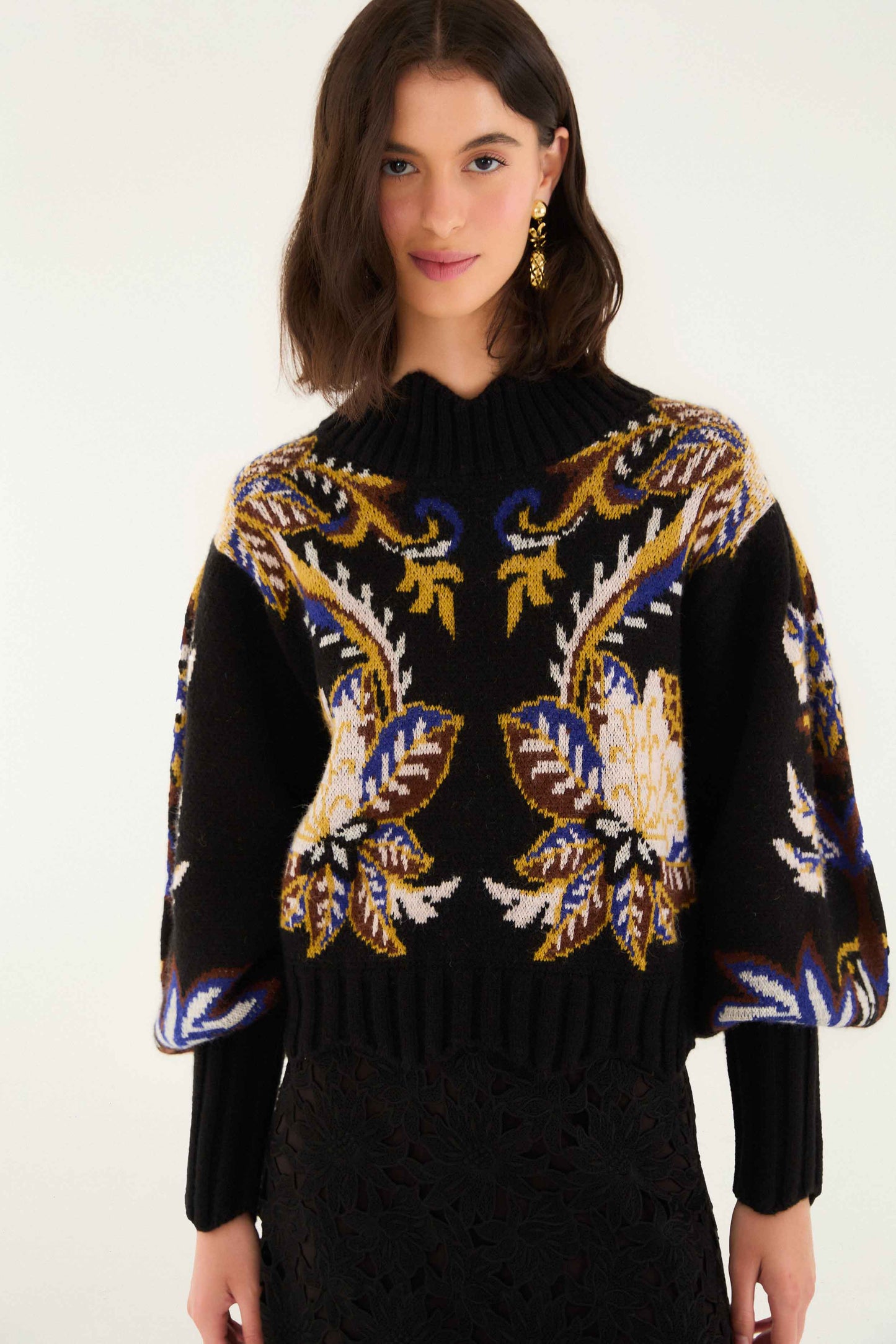 FARM Rio model wearing the Arabesque Paradise Knit Sweater