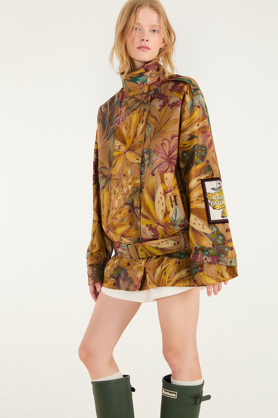 FARM Rio model wearing the Banana Groove High Neck Wax Coat