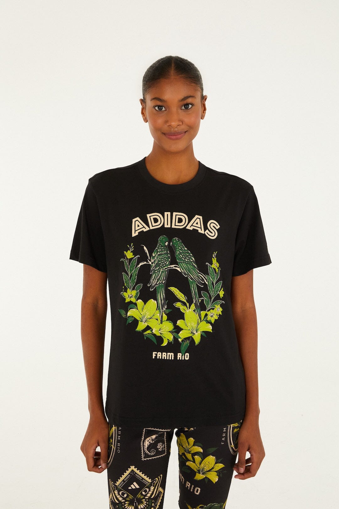 FARM Rio model wearing the Birds Black Adidas T-Shirt