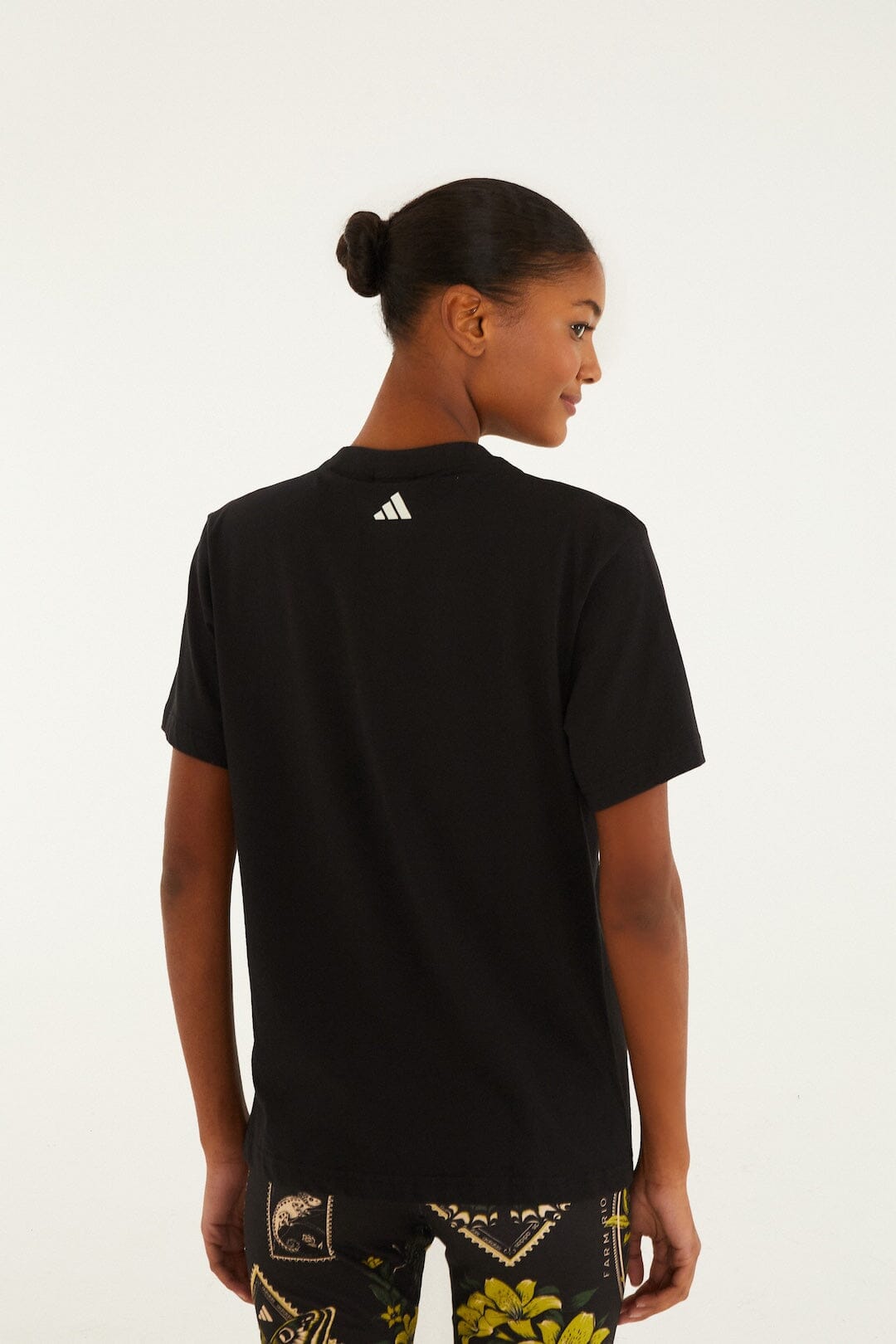 FARM Rio model wearing the Birds Black Adidas T-Shirt