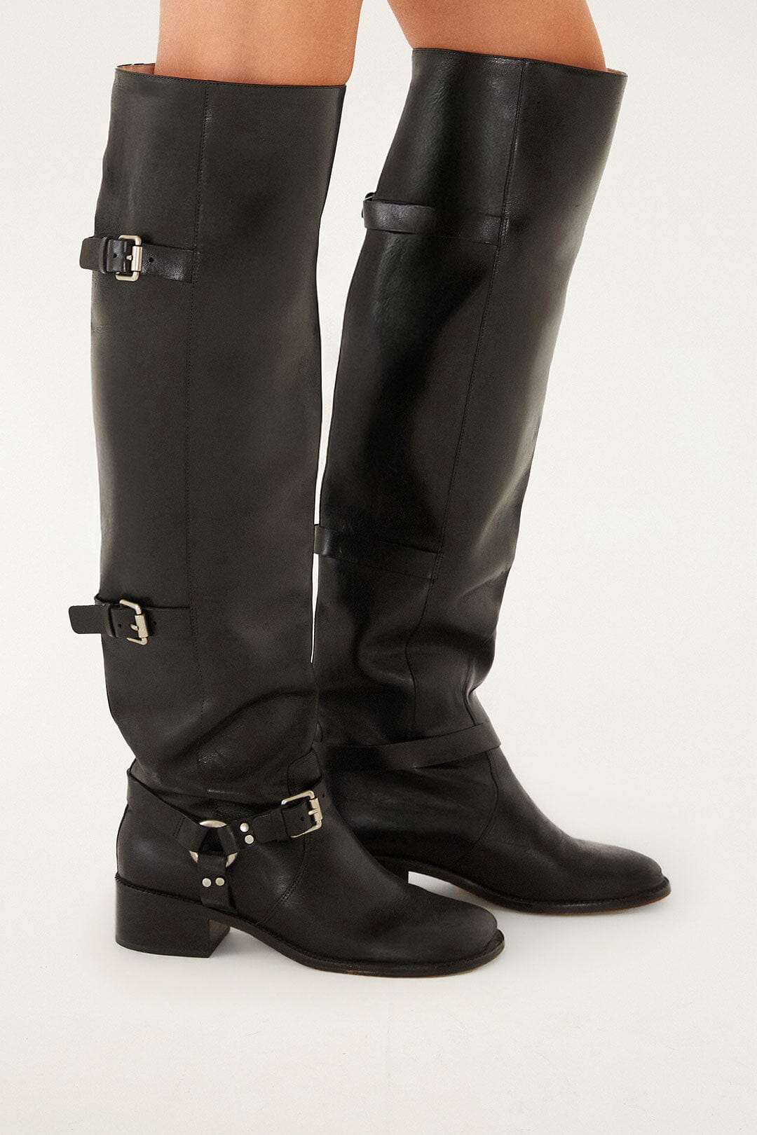 FARM Rio model wearing the Black Distressed Leather Buckled Over-The-Knee Boot