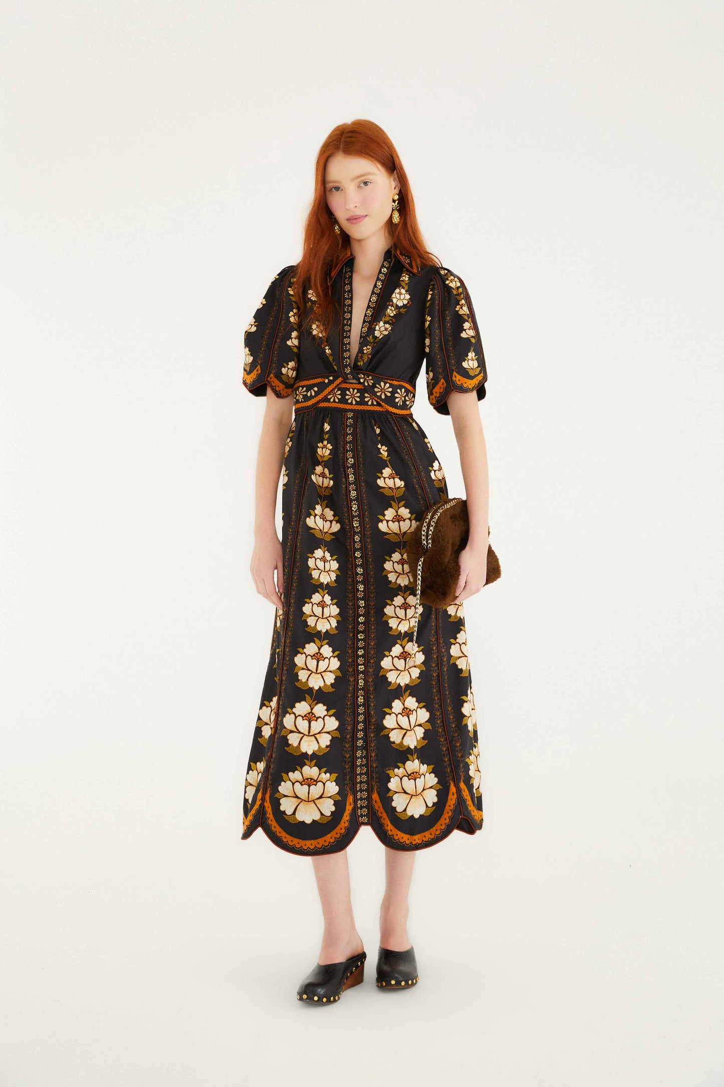 FARM Rio model wearing the Black Embroidered Flowers Organic Cotton Midi Dress