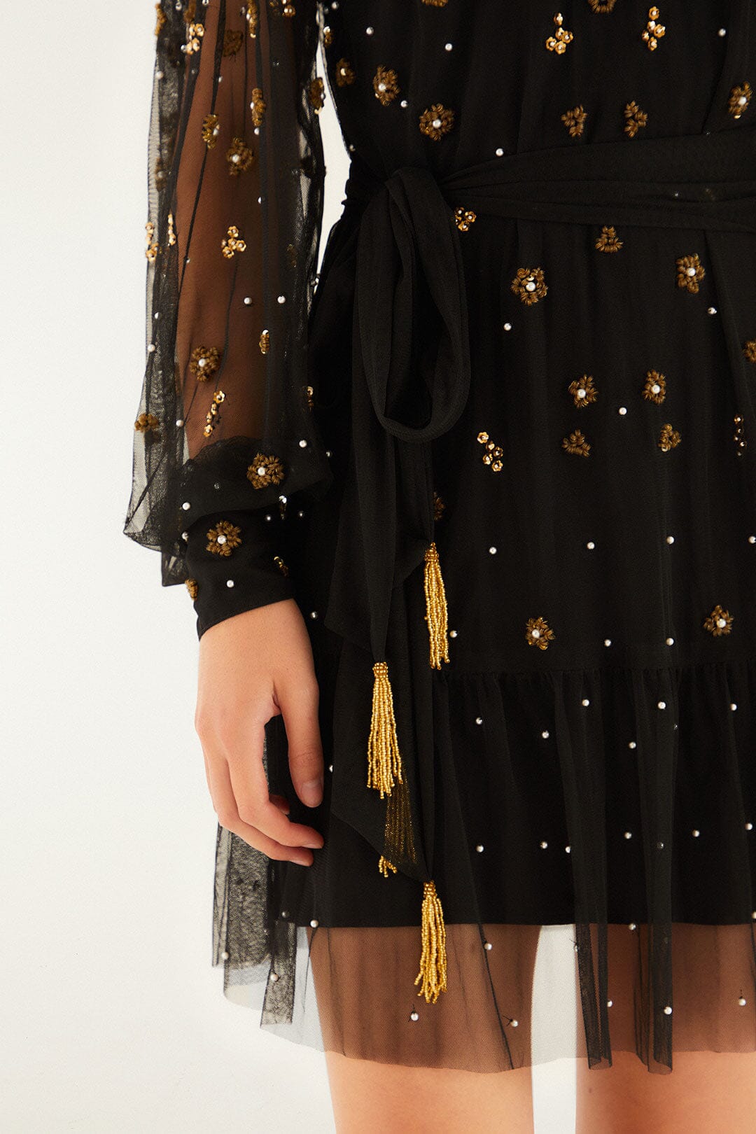 FARM Rio model wearing the Black Embroidered Tulle Belted Long Sleeve Mini Dress