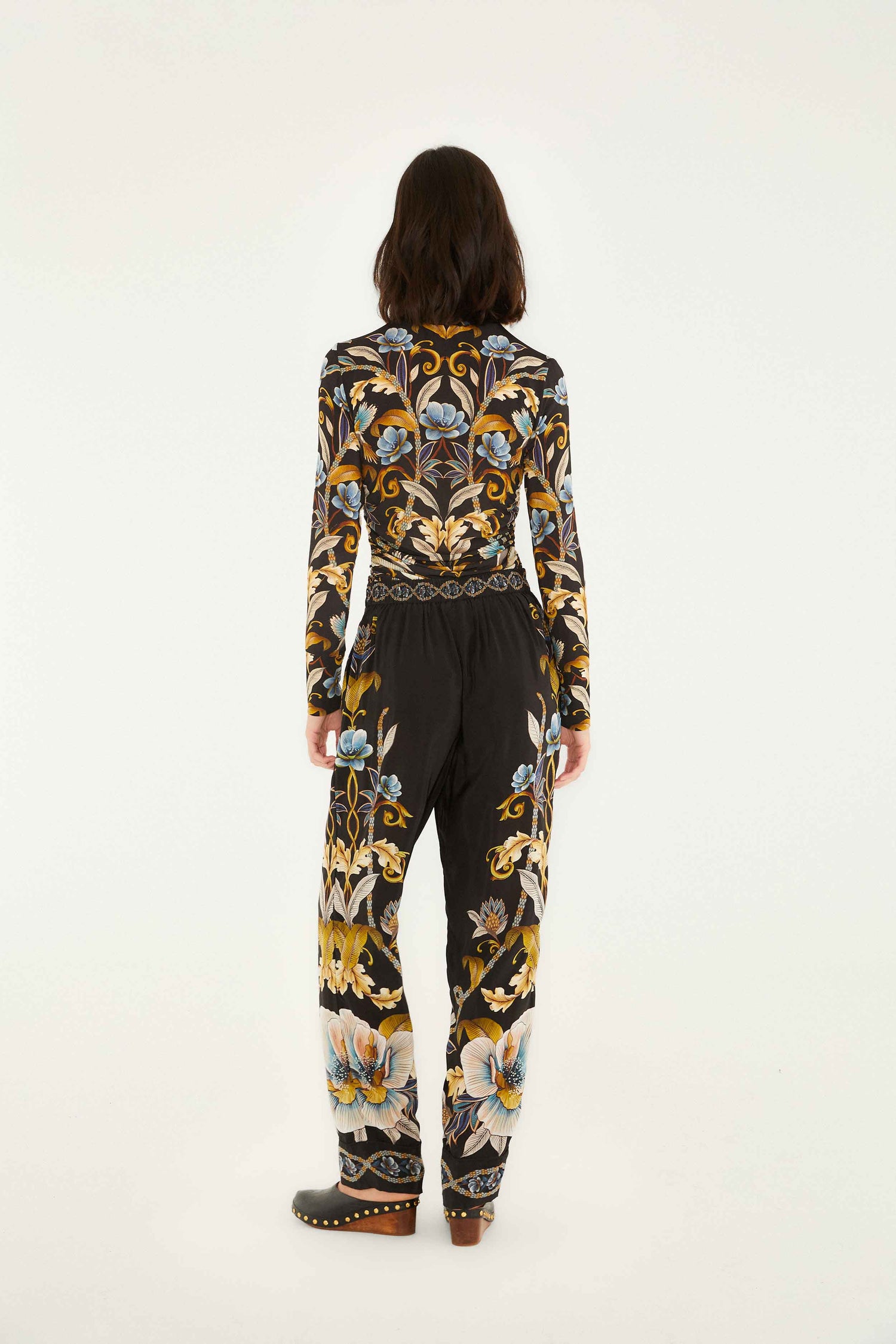 FARM Rio model wearing the Black Flowerful Garden Pajama Pants