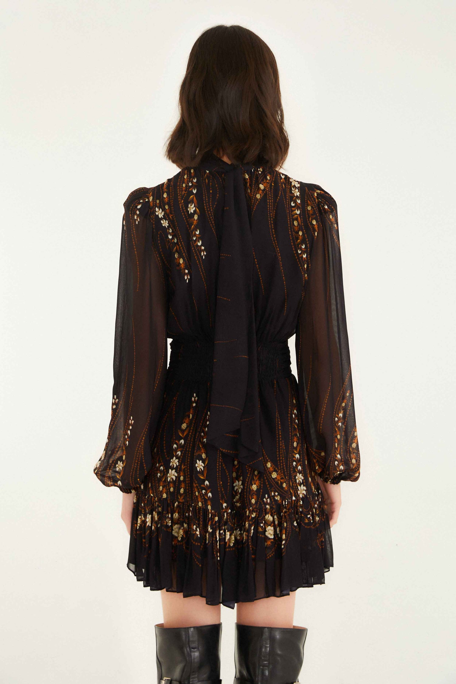 FARM Rio model wearing the Black Garden 3d Rose Long Sleeve Ruffled Mini Dress