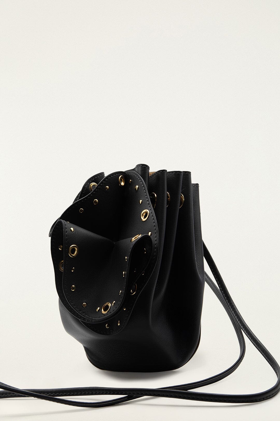 FARM Rio model wearing the Black Leather Studded Crossbody Flower Bag