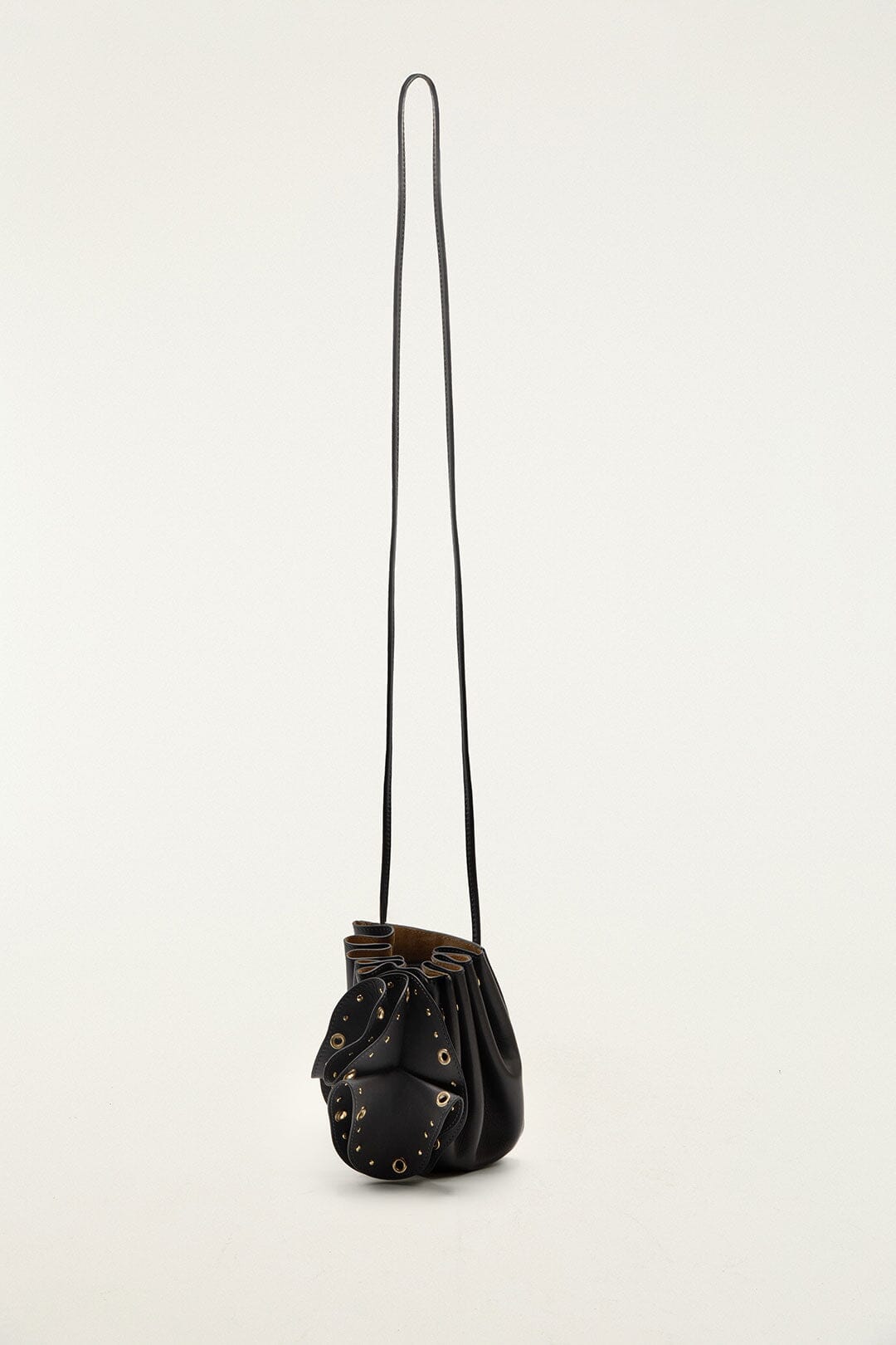 FARM Rio model wearing the Black Leather Studded Crossbody Flower Bag