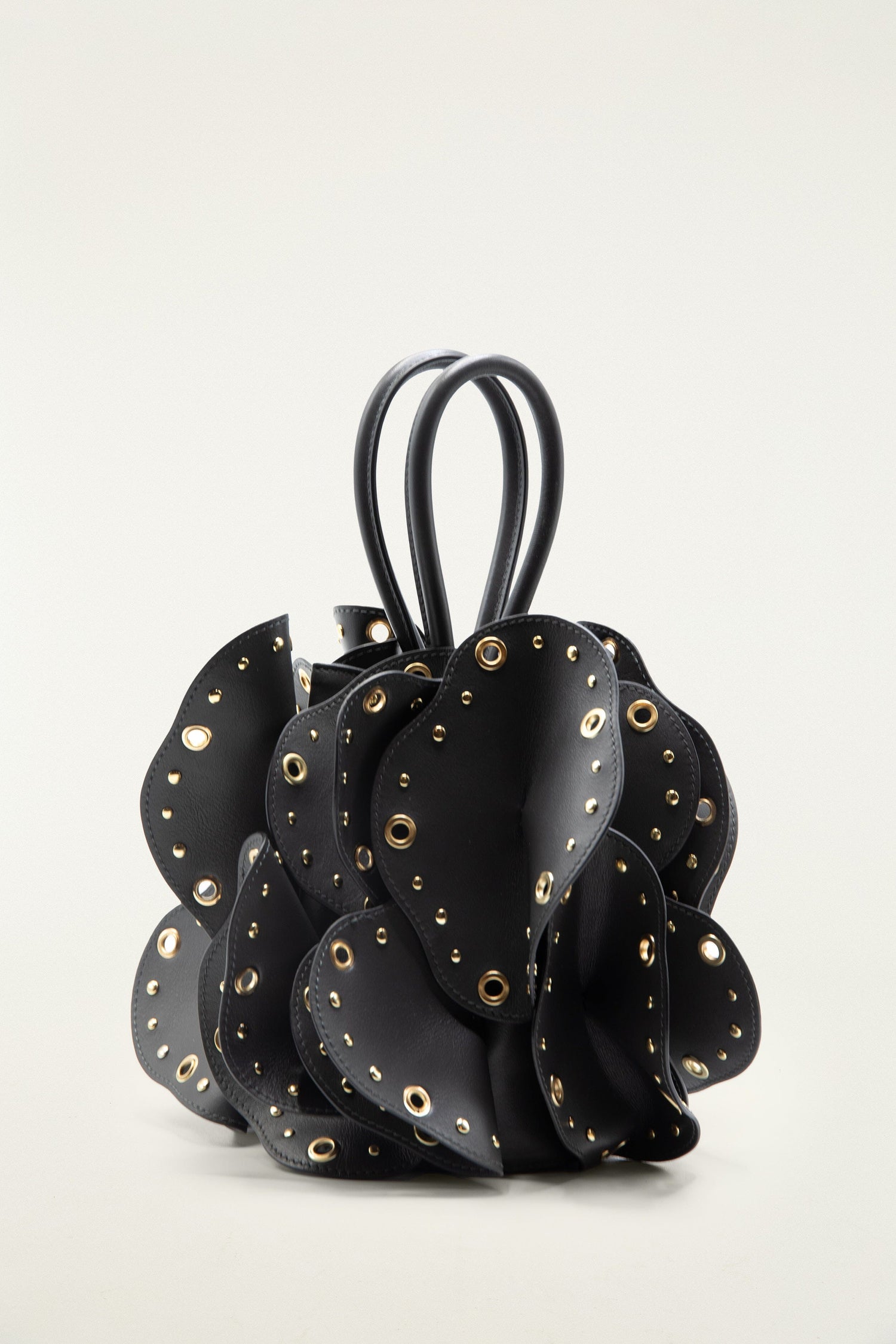 FARM Rio model wearing the Black Leather Studded Flower Bag