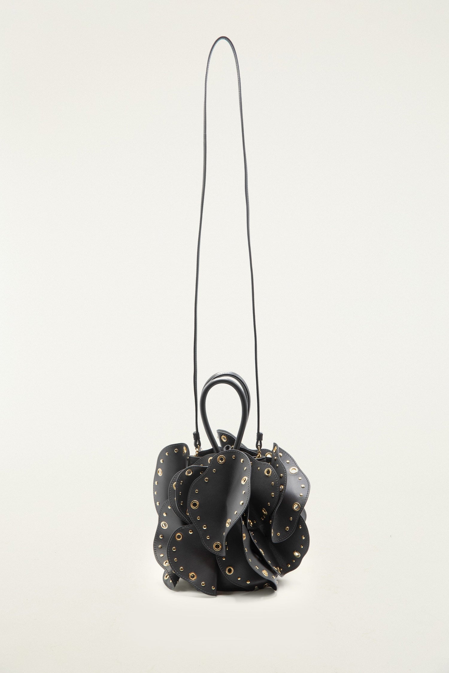 FARM Rio model wearing the Black Leather Studded Flower Bag