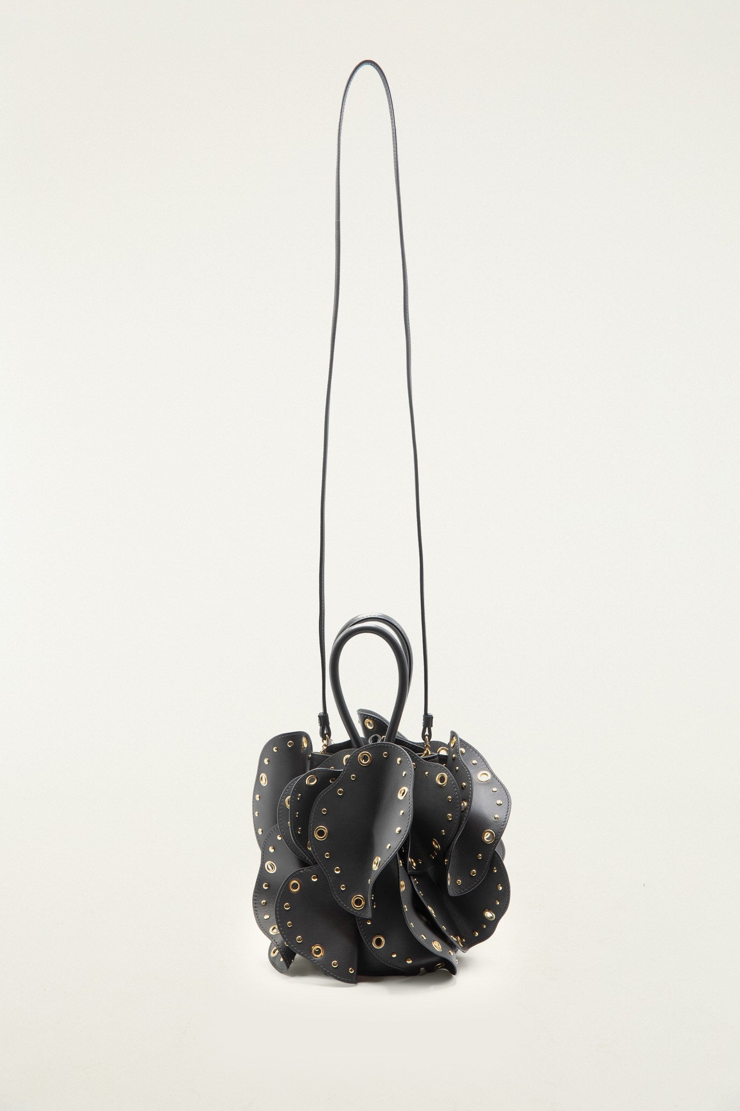 FARM Rio model wearing the Black Leather Studded Flower Bag