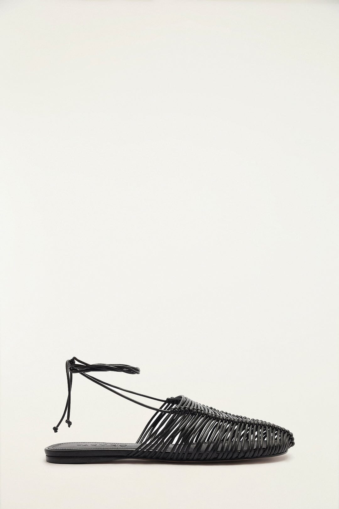 FARM Rio model wearing the Black Macrame Mule
