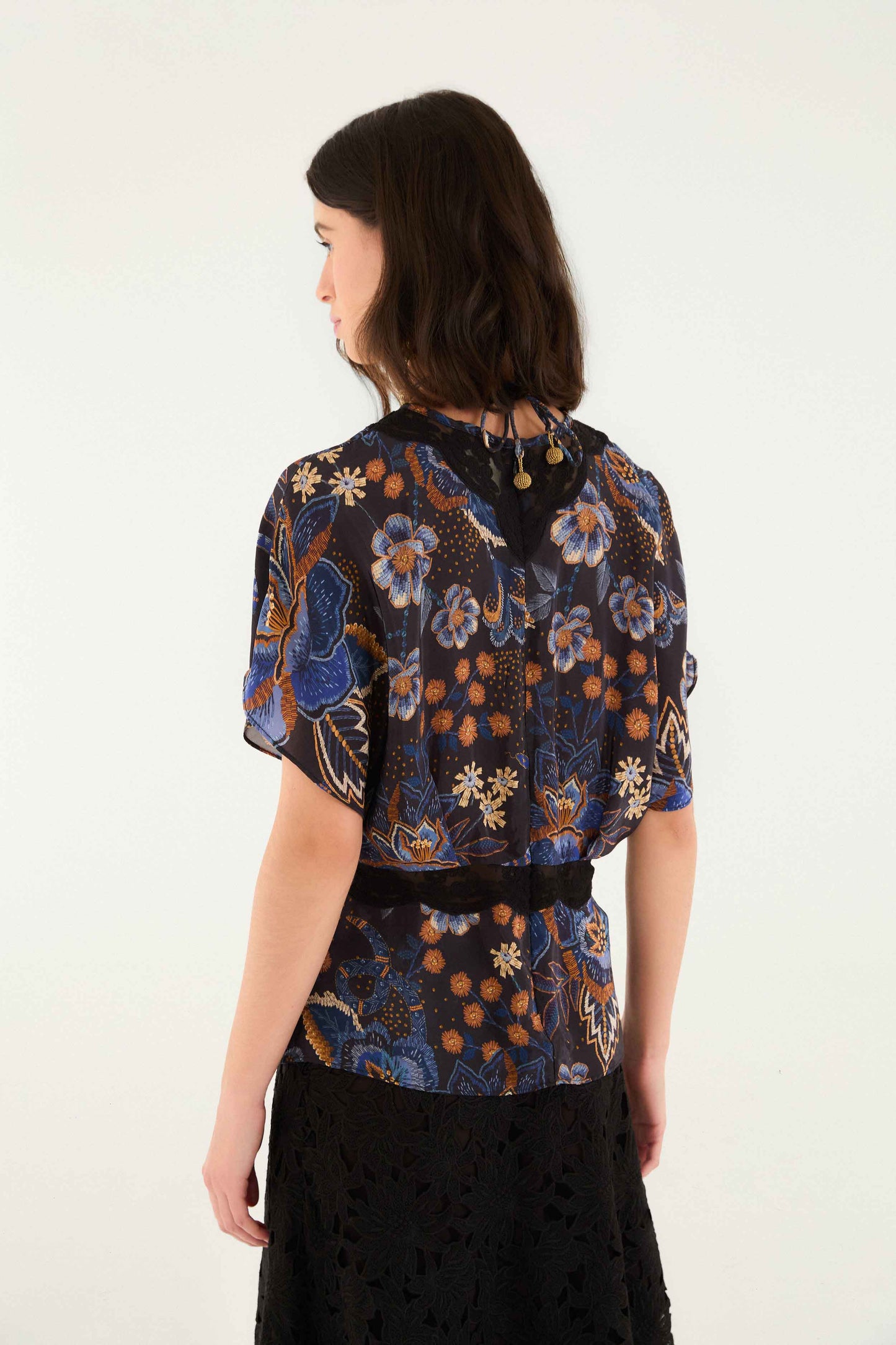 FARM Rio model wearing the Black Snakes Bouquet Blouse