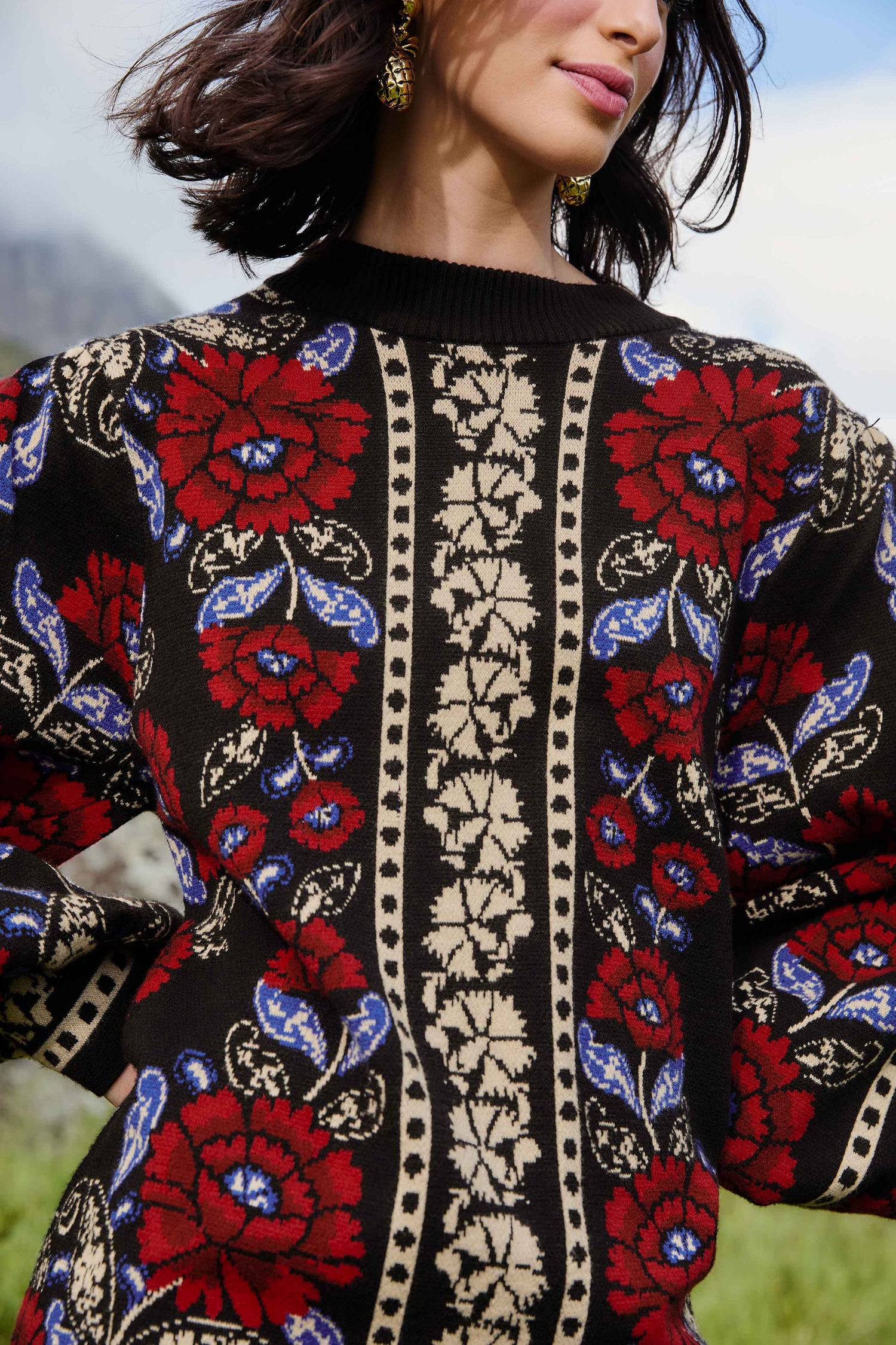 FARM Rio model wearing the Black Valentina Puff Sleeve Knit Dress