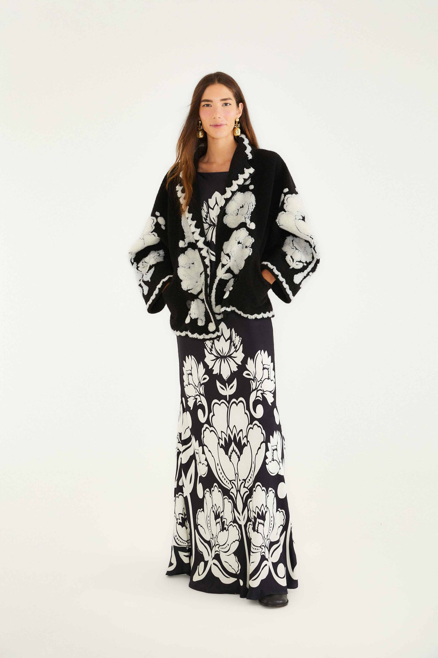 FARM Rio model wearing the Black & White Floral Arabesque Fleece Coat