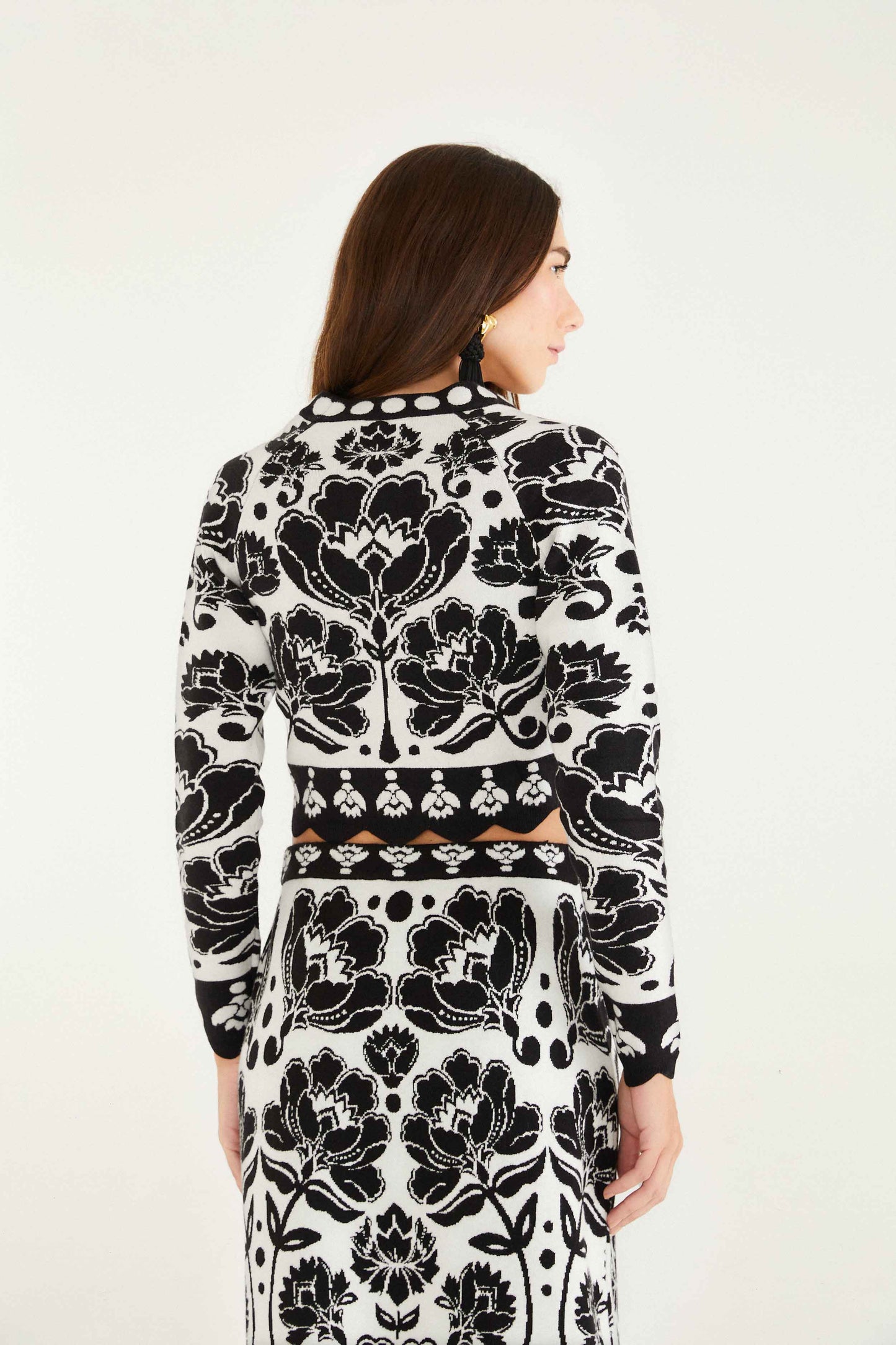 FARM Rio model wearing the Black & White Floral Arabesque Knit Top